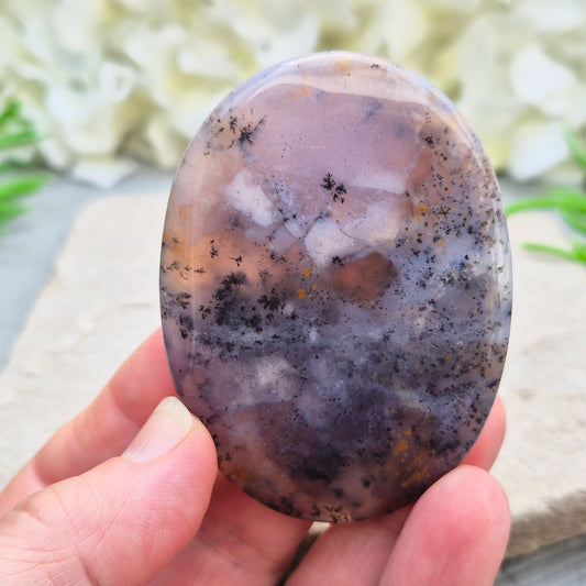 Merlinite Palm Stone - a grounding and intuitive crystal for meditation, inner balance and spiritual work. Smooth pocket stone for daily calm energy.