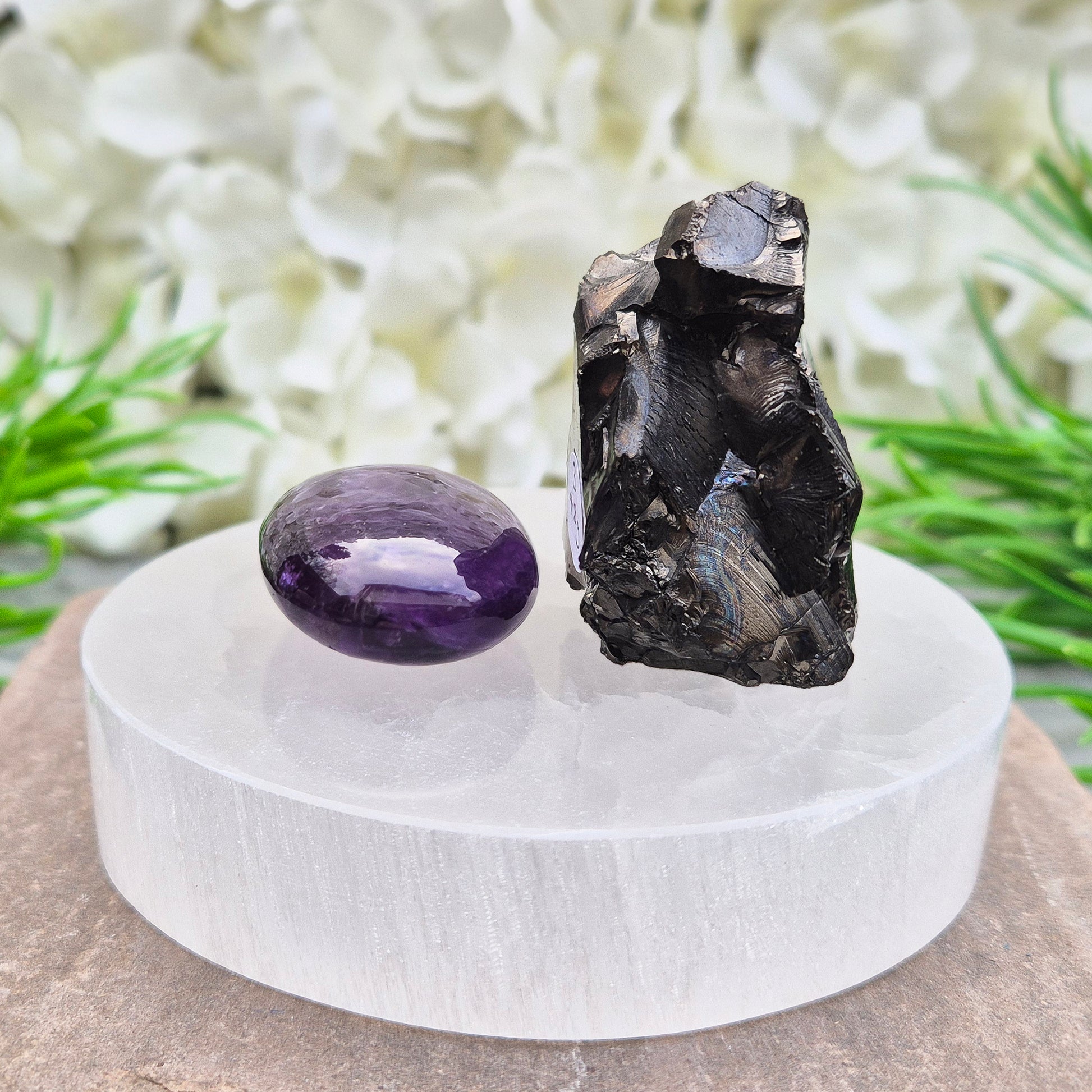 Polished Selenite charging plate that clears heavy energy and recharges your crystals. Ideal for daily cleansing.