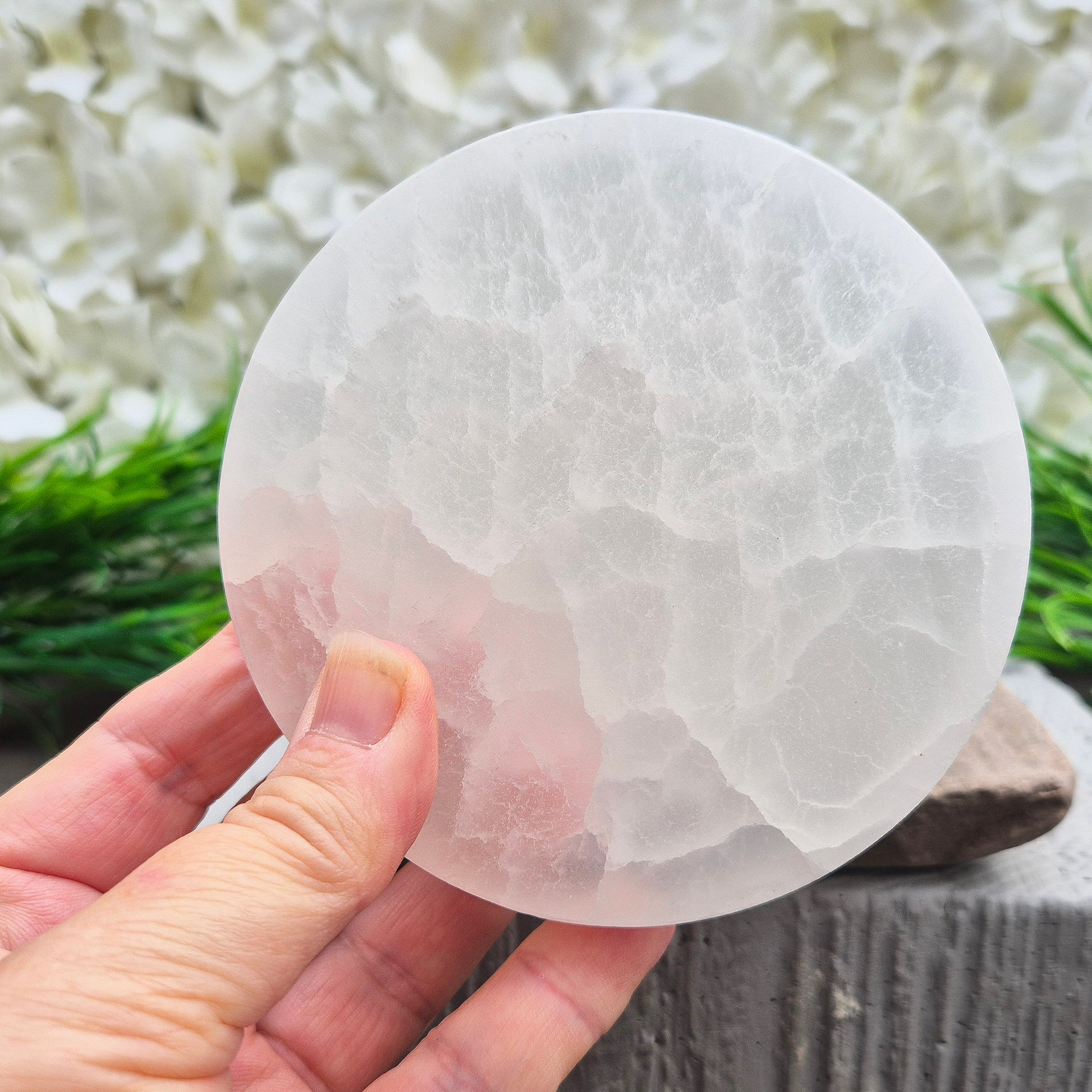 Polished Selenite charging plate that clears heavy energy and recharges your crystals. Ideal for daily cleansing.