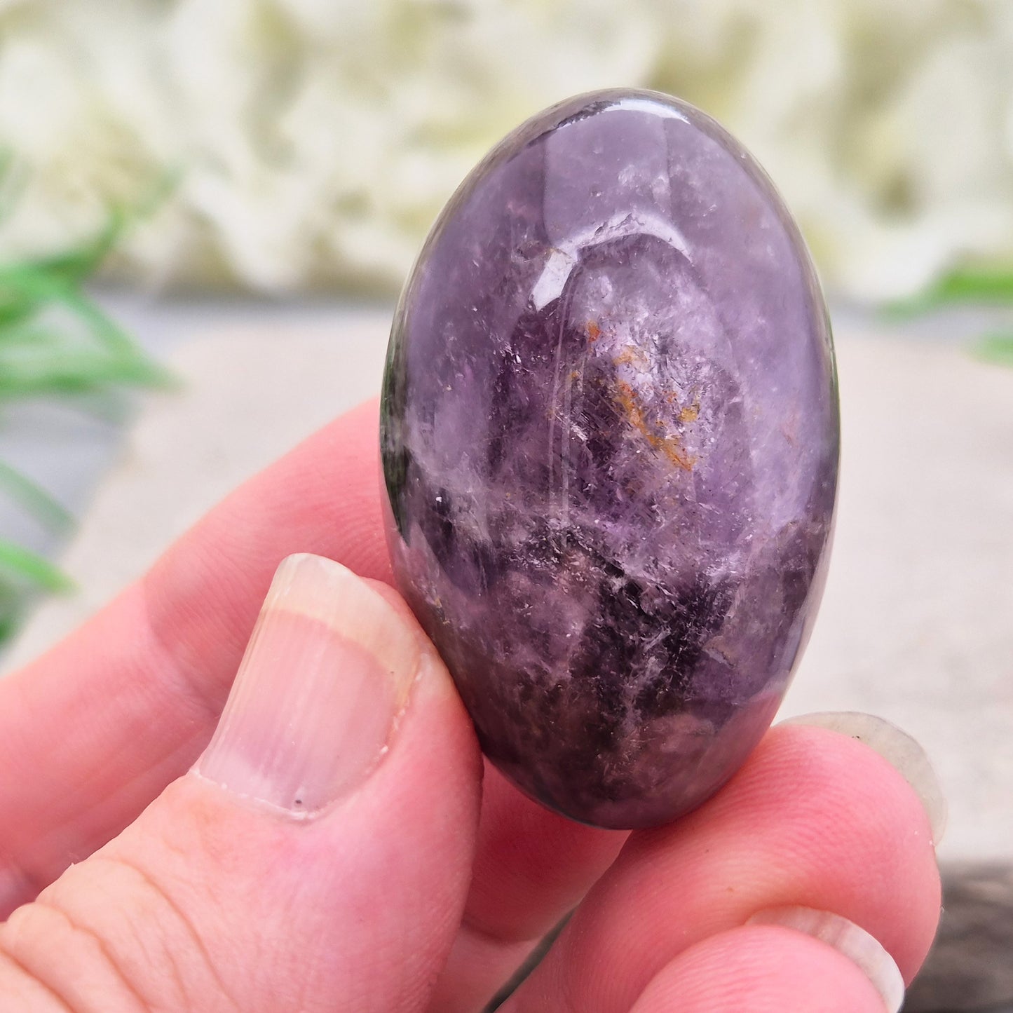 Ametrine polished palm stone with soft purple and golden tones. A natural blend of Amethyst and Citrine with a balanced, easy feel. 
