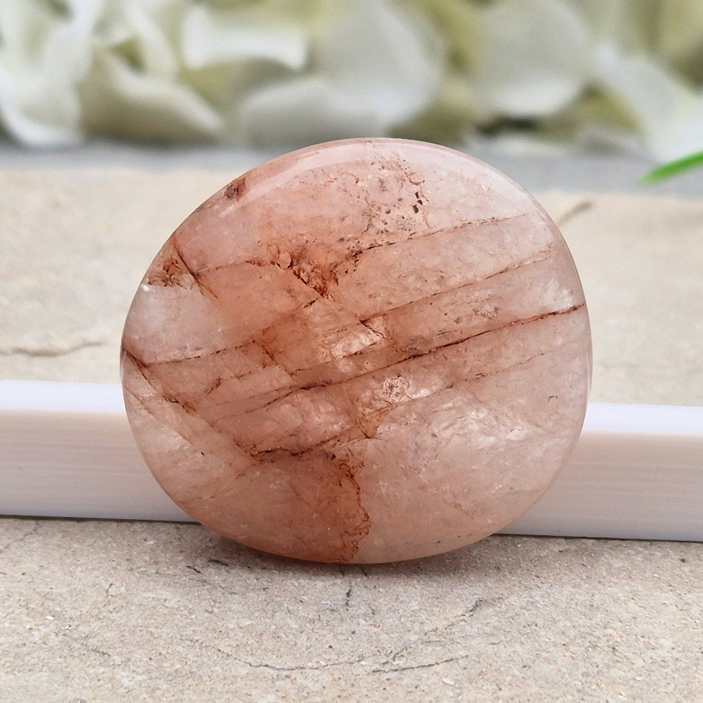 Natural Crimson Healer Palm Stone (Hematoid Quartz). Traditionally used for grounding, focus and self-belief. 