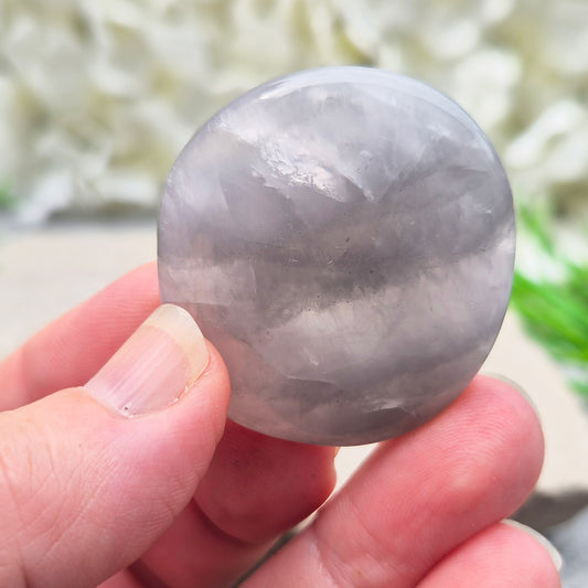 Lunar Quartz palm stones for peace, creativity, and spiritual connection. Handpicked crystals to support calm energy and open communication.