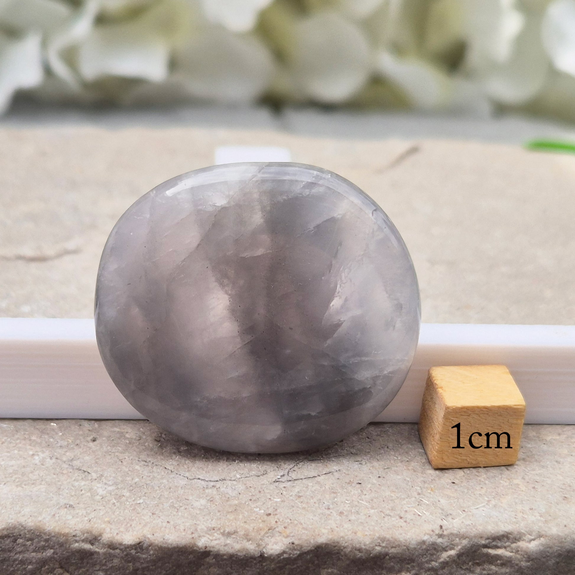 Lunar Quartz palm stones for peace, creativity, and spiritual connection. Handpicked crystals to support calm energy and open communication.