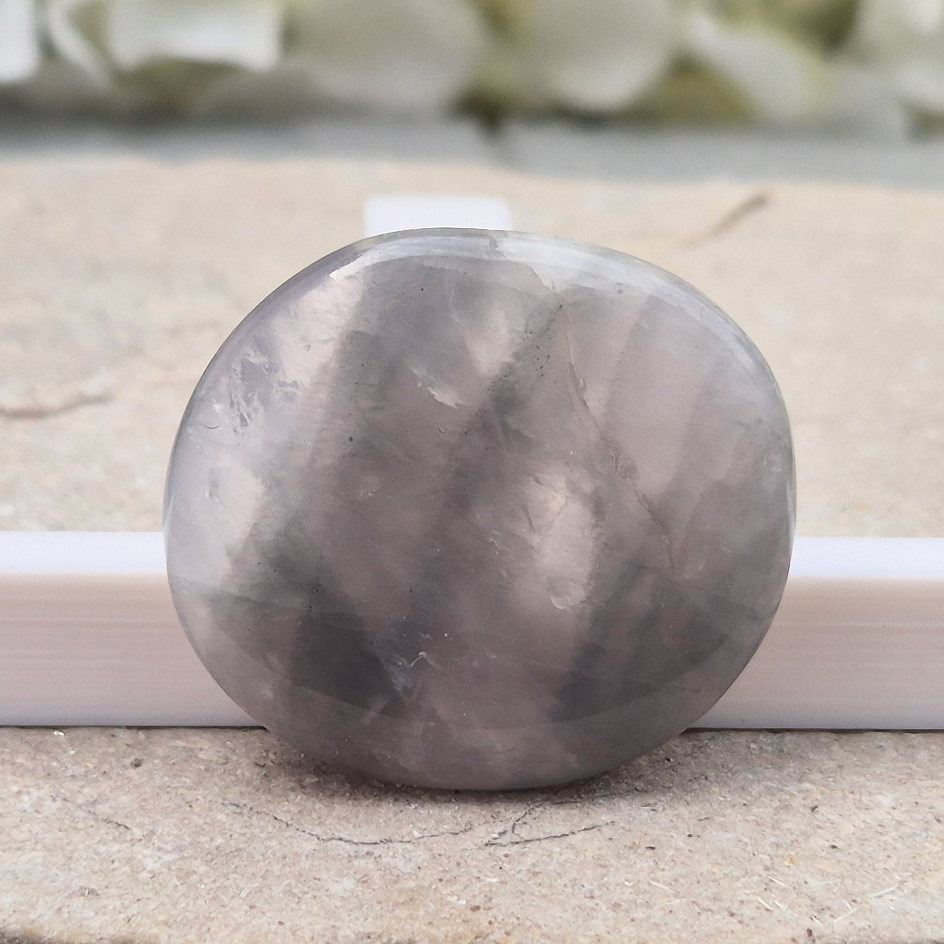 Lunar Quartz palm stones for peace, creativity, and spiritual connection. Handpicked crystals to support calm energy and open communication.