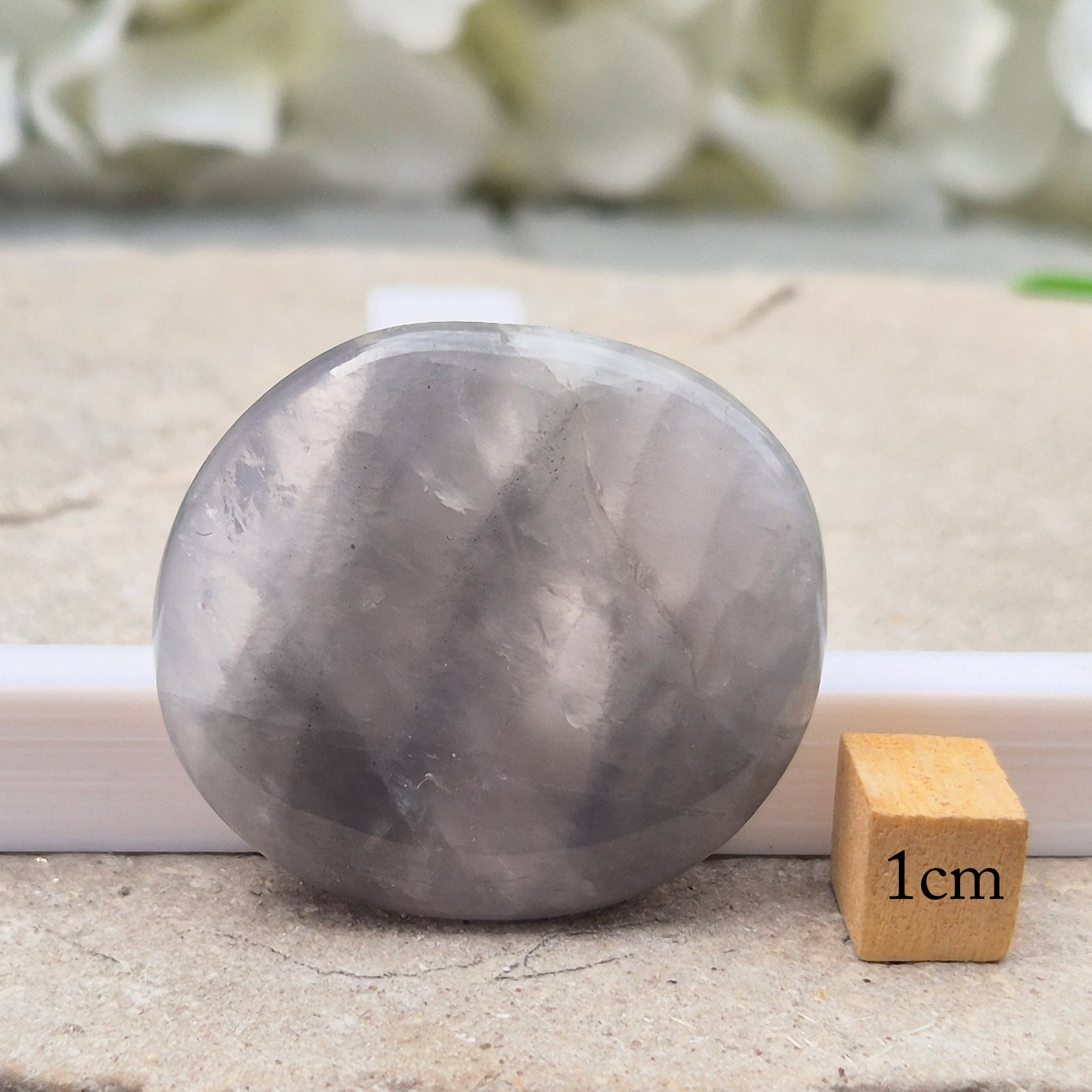 Lunar Quartz palm stones for peace, creativity, and spiritual connection. Handpicked crystals to support calm energy and open communication.