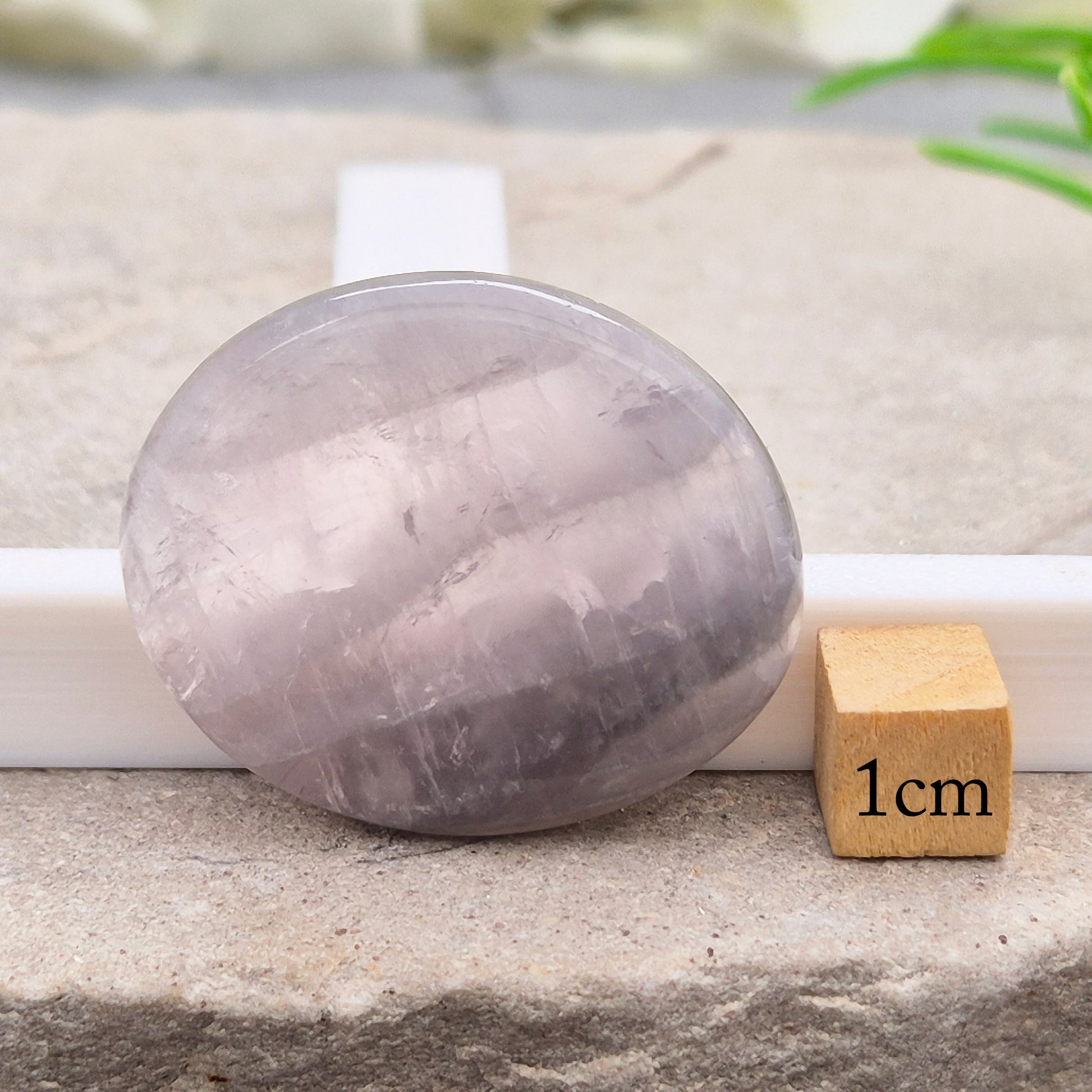 Lunar Quartz palm stones for peace, creativity, and spiritual connection. Handpicked crystals to support calm energy and open communication.