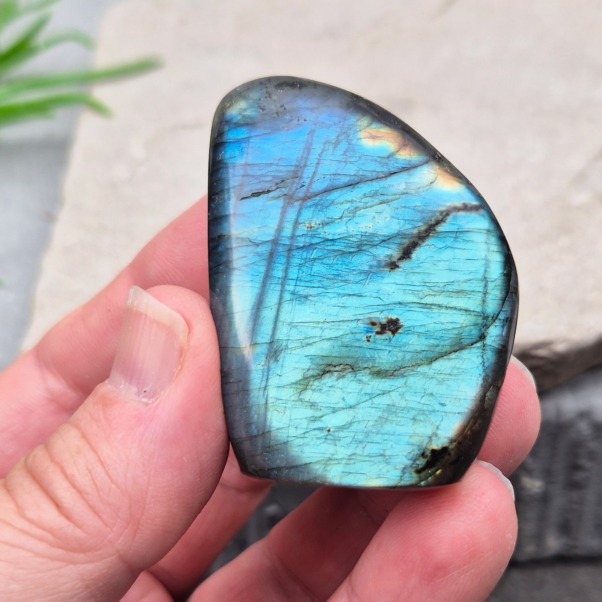 Labradorite freeform crystal with flashes of colour. Supports intuition, focus, and spiritual balance. Perfect for display or energy work.