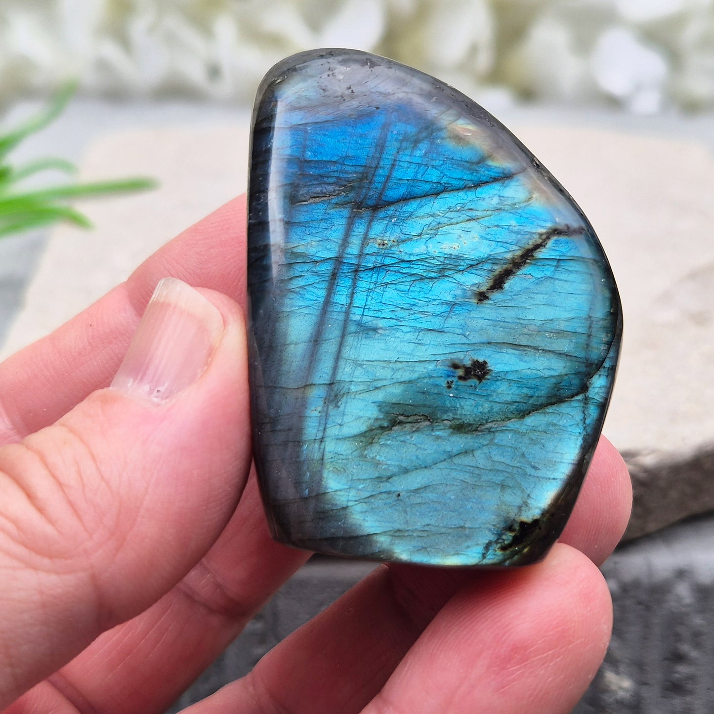 Labradorite freeform crystal with flashes of colour. Supports intuition, focus, and spiritual balance. Perfect for display or energy work.