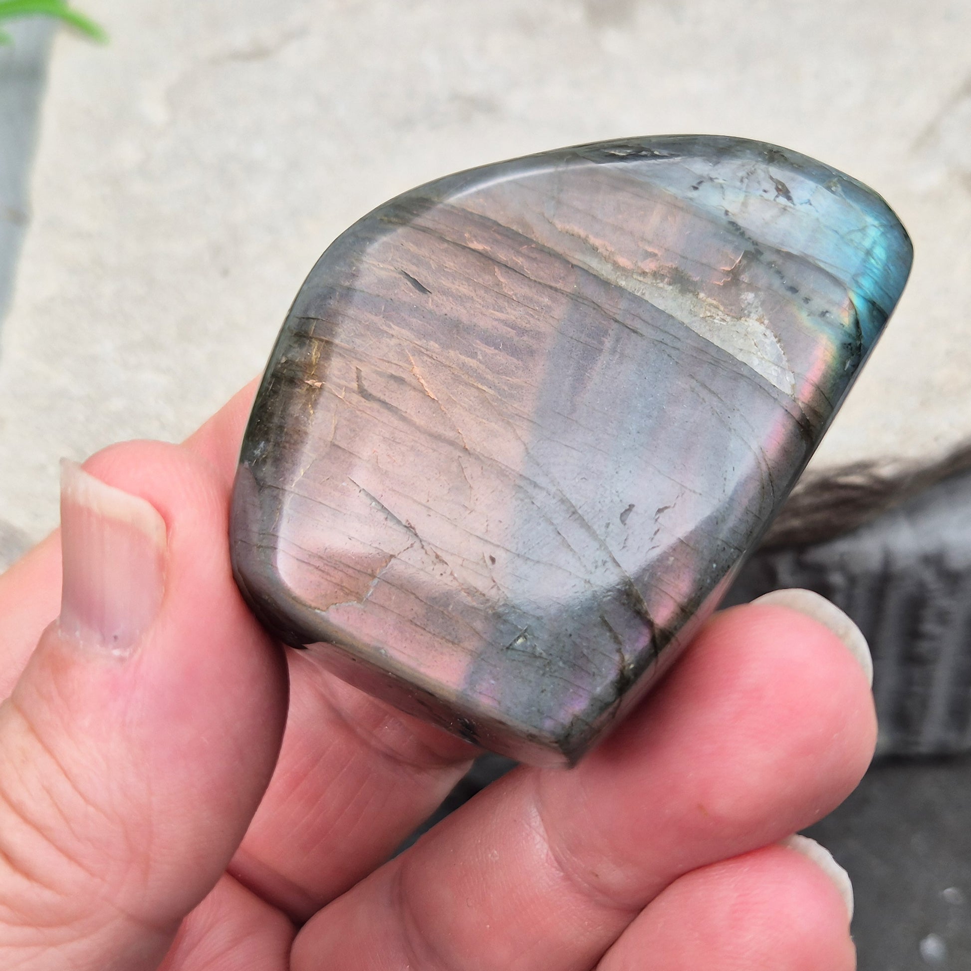 Labradorite freeform crystal with flashes of colour. Supports intuition, focus, and spiritual balance. Perfect for display or energy work.