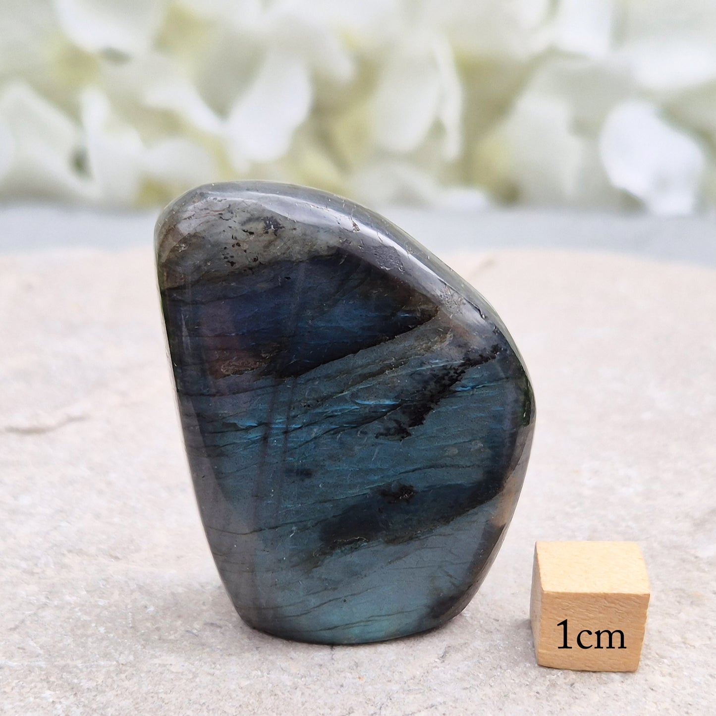 Labradorite freeform crystal with flashes of colour. Supports intuition, focus, and spiritual balance. Perfect for display or energy work.