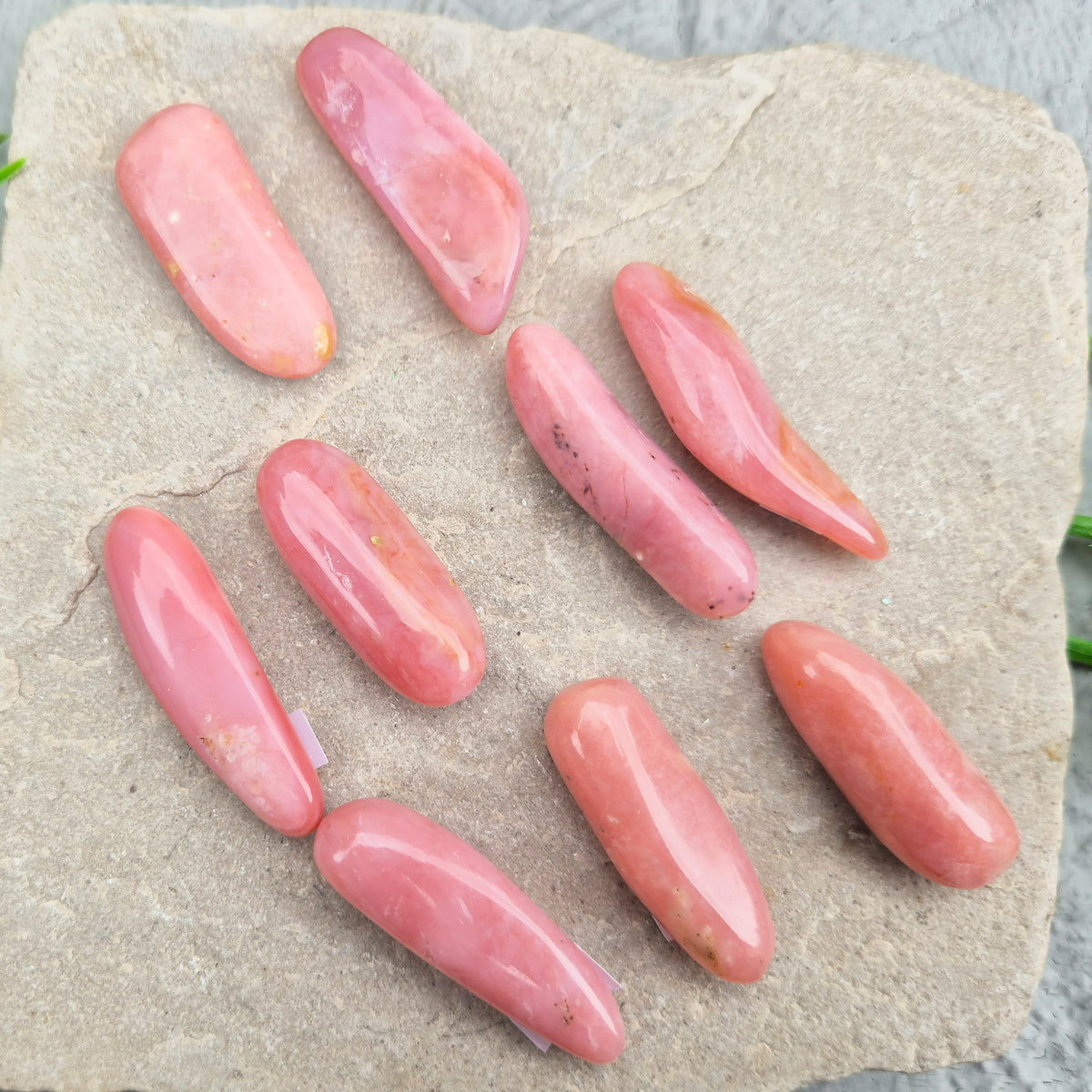 Pink Opal polished wand in soft pink to salmon tones. Linked to the heart chakra, known as a gentle, supportive stone during difficult or emotional times.