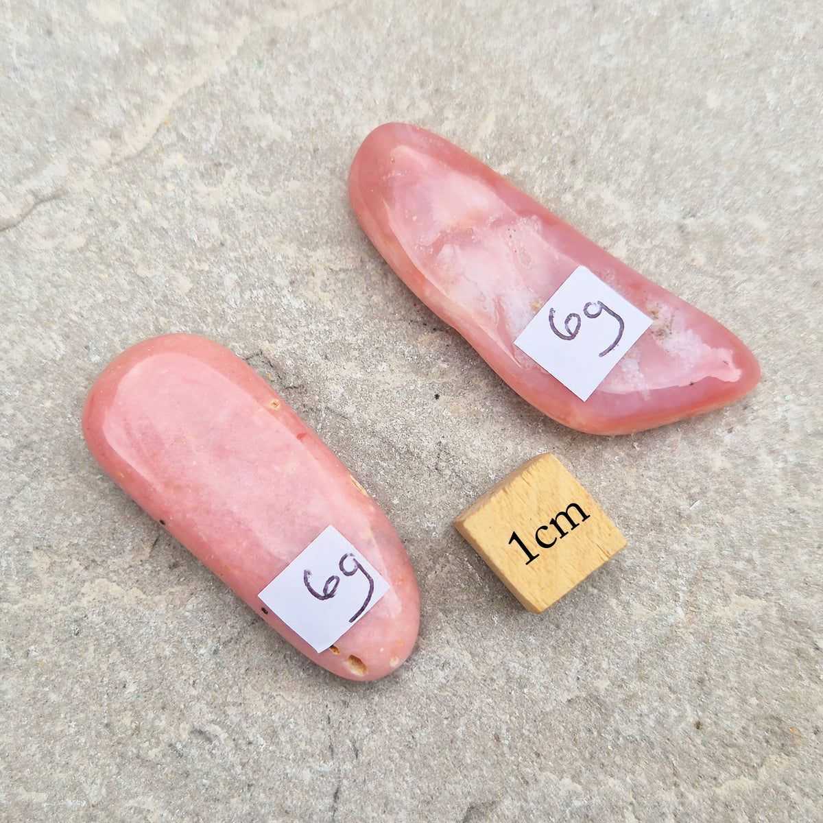 Pink Opal polished wand in soft pink to salmon tones. Linked to the heart chakra, known as a gentle, supportive stone during difficult or emotional times.