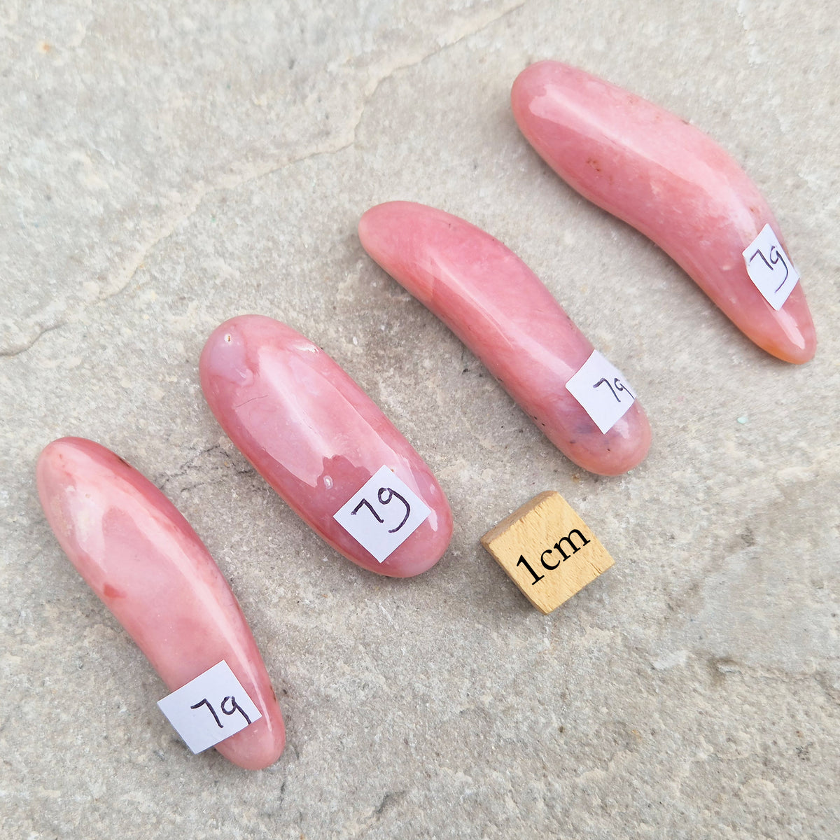 Pink Opal polished wand in soft pink to salmon tones. Linked to the heart chakra, known as a gentle, supportive stone during difficult or emotional times.