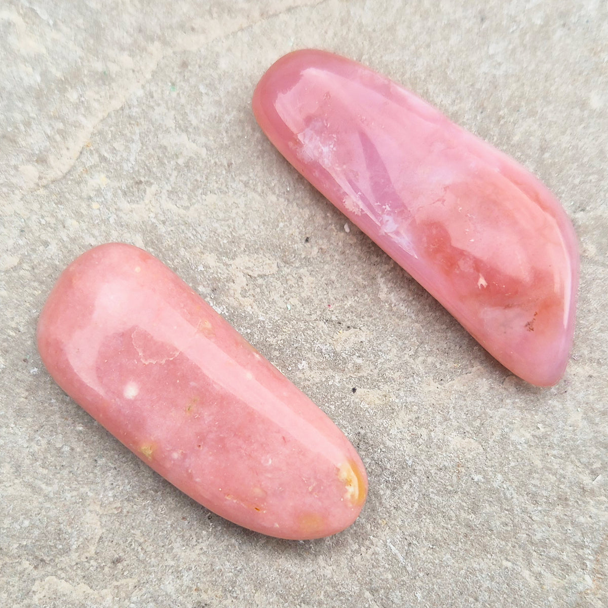 Pink Opal polished wand in soft pink to salmon tones. Linked to the heart chakra, known as a gentle, supportive stone during difficult or emotional times.