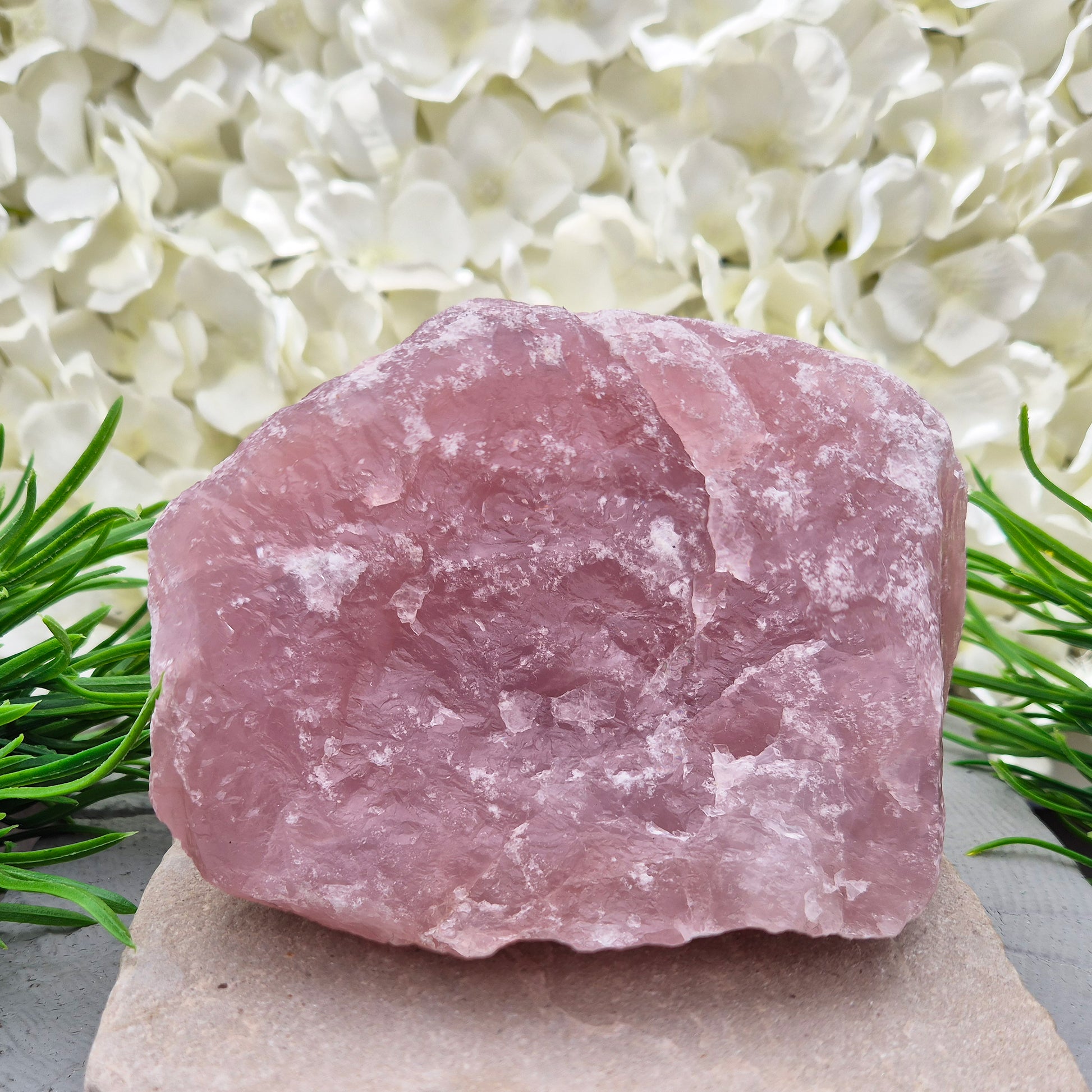 Natural Rose Quartz crystal from Namibia. Gentle stone of love that brings calm, emotional support, balance, and unconditional self-love.