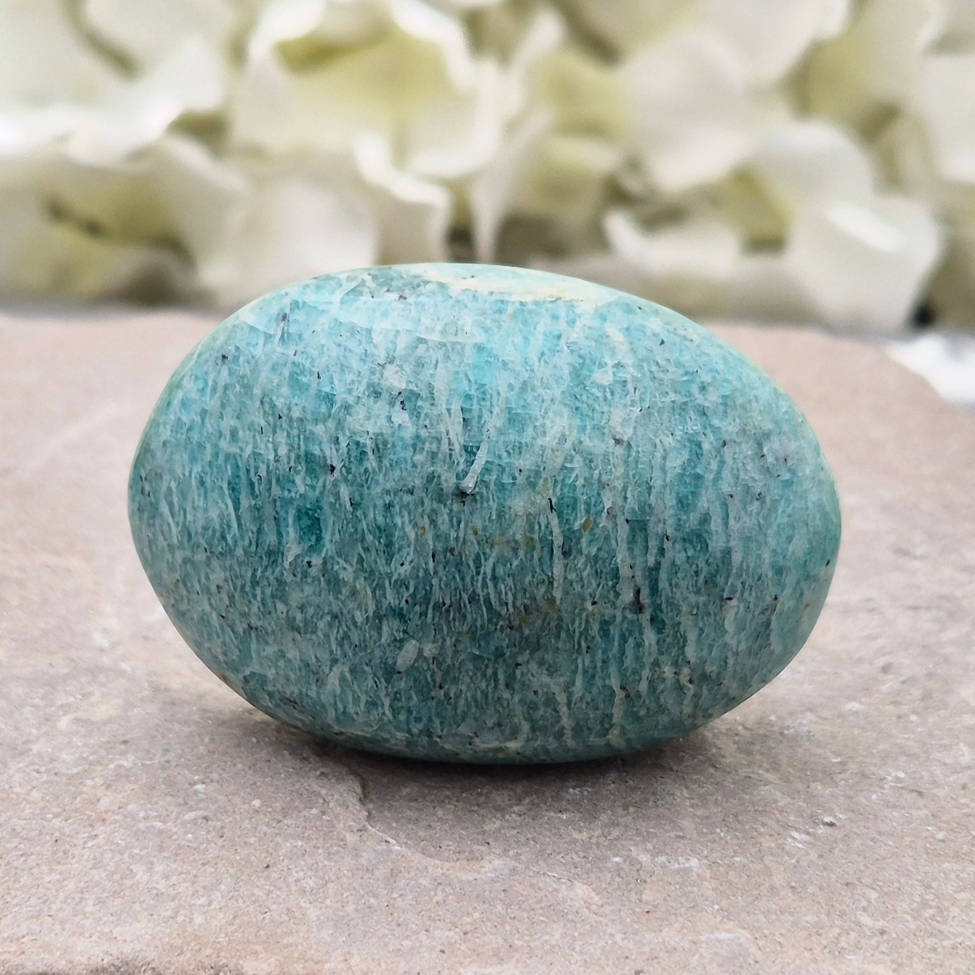 Smooth Amazonite pebble from Mozambique. A calming stone often linked to honest, grounded communication. Hand-picked crystals, UK independent shop.