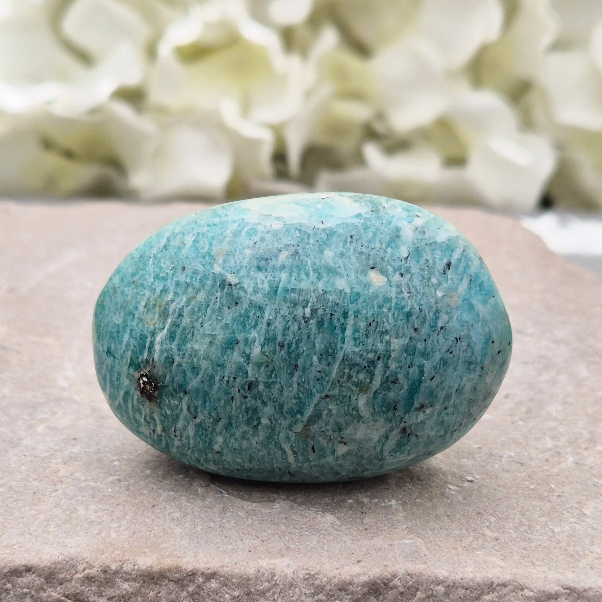 Smooth Amazonite pebble from Mozambique. A calming stone often linked to honest, grounded communication. Hand-picked crystals, UK independent shop.