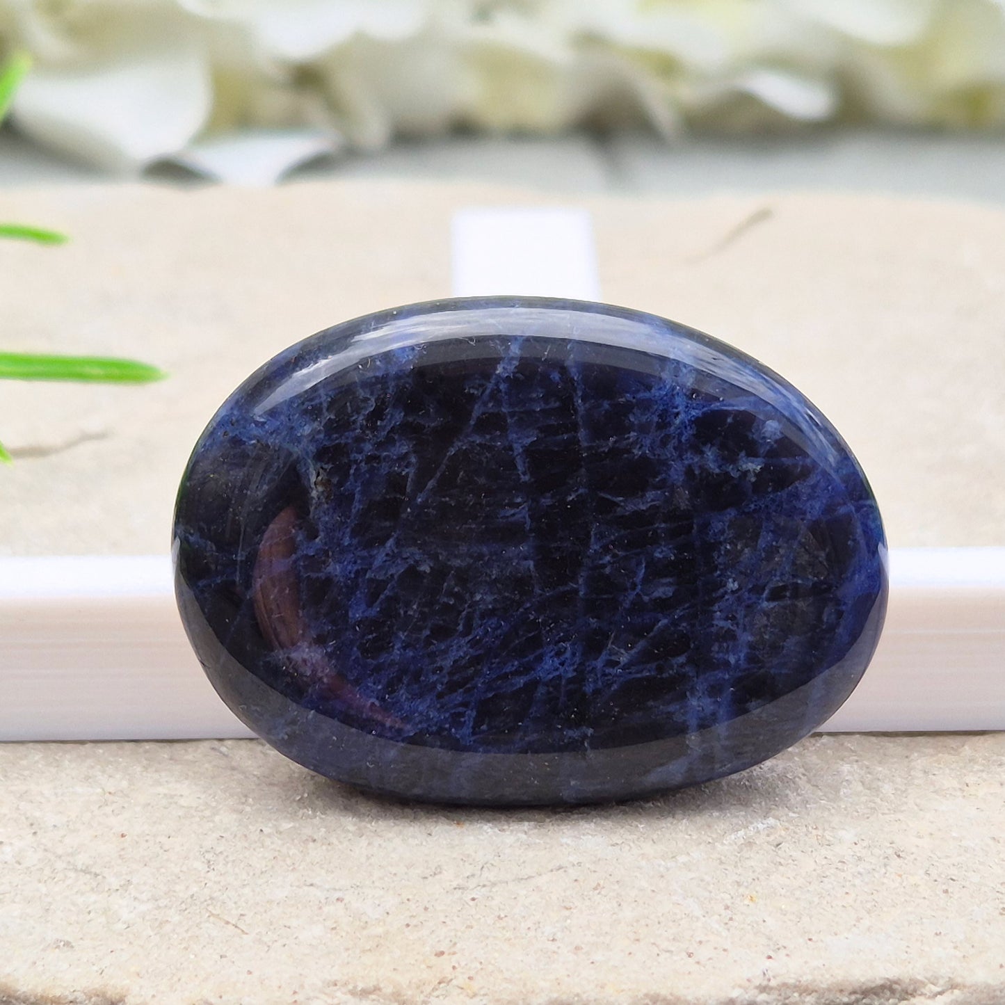 Beautiful A-grade Sodalite palm stone from Namibia. Supports clear thinking, confidence in communication, and emotional calm. Throat & Third Eye chakra crystal.
