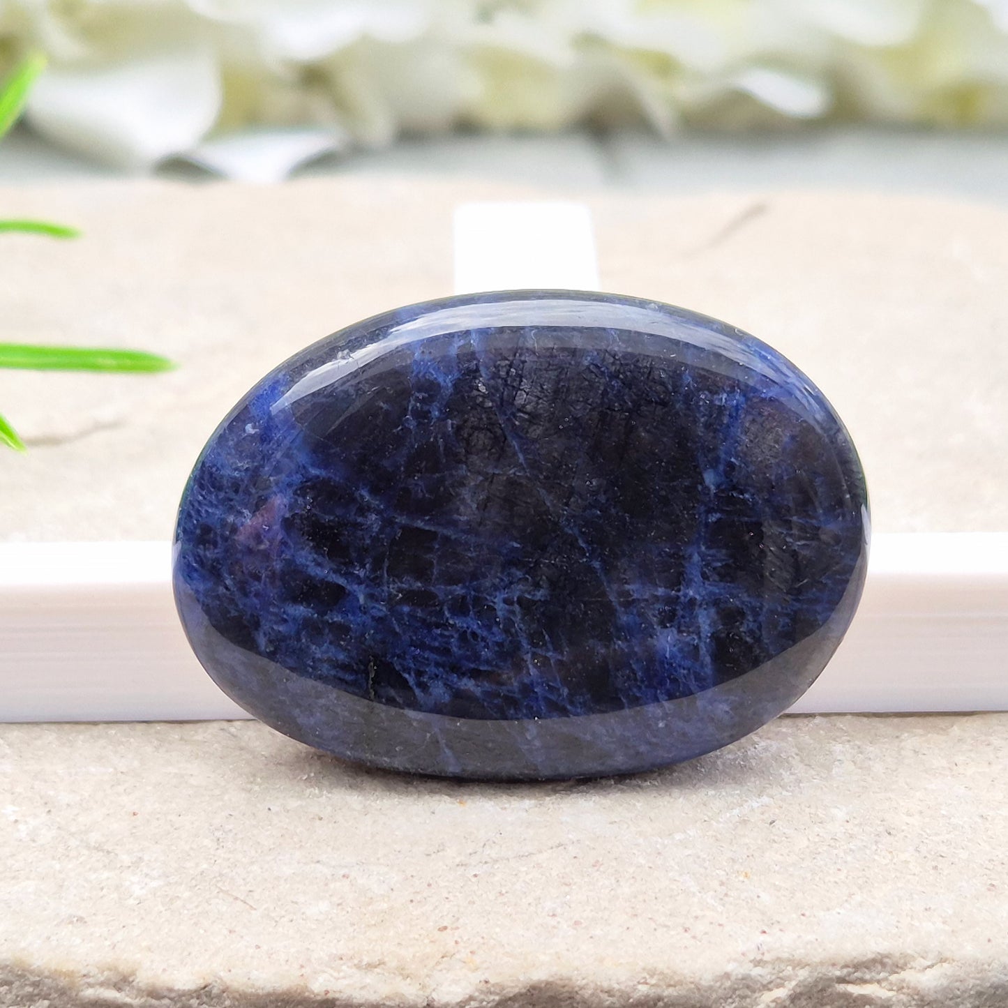 Beautiful A-grade Sodalite palm stone from Namibia. Supports clear thinking, confidence in communication, and emotional calm. Throat & Third Eye chakra crystal.