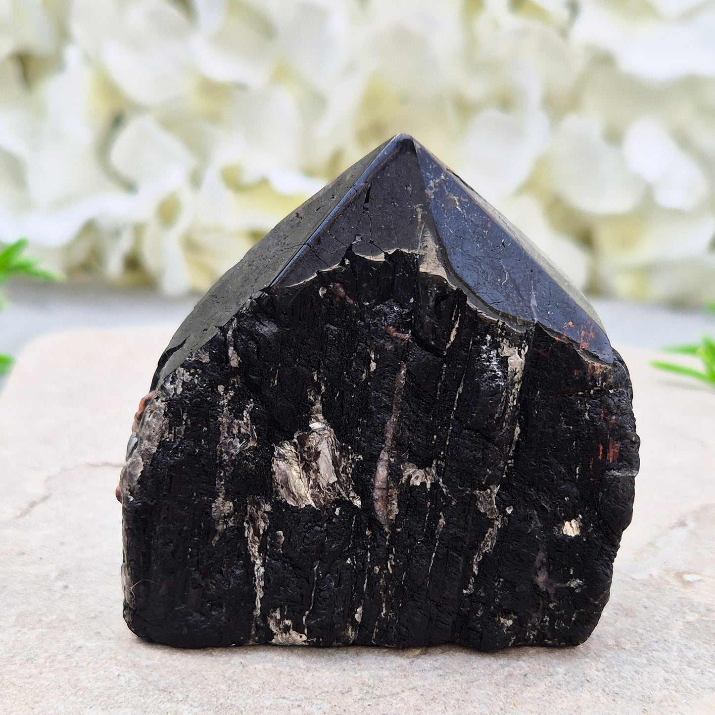 Hand-picked A grade Black Tourmaline standing point from a UK independent shop. Known for grounding energy — a striking, one-of-a-kind piece.