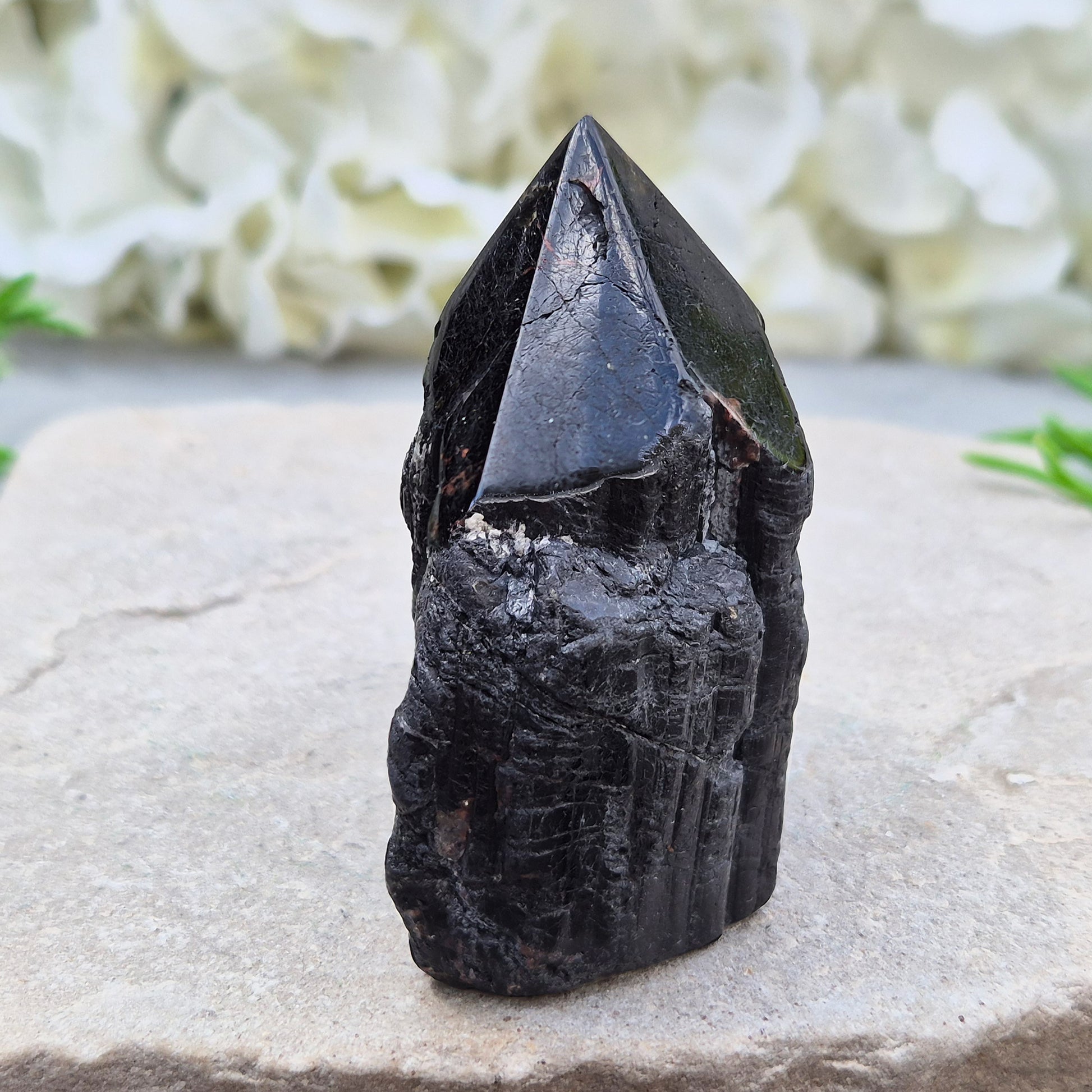 Hand-picked A grade Black Tourmaline standing point from a UK independent shop. Known for grounding energy — a striking, one-of-a-kind piece.