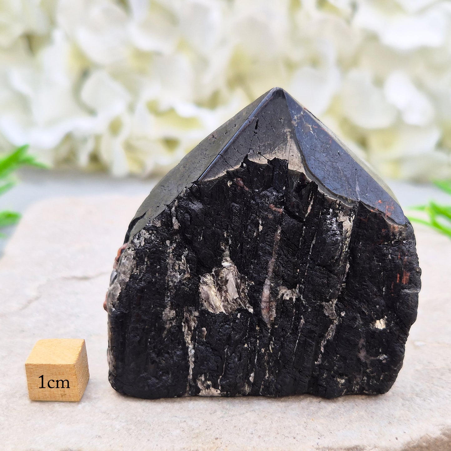 Hand-picked A grade Black Tourmaline standing point from a UK independent shop. Known for grounding energy — a striking, one-of-a-kind piece.