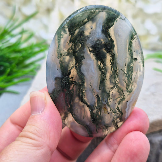 Polished Moss Agate palm stone. Known as a stone of nature, grounding and growth, it supports balance, stability and a calm, centred mind.