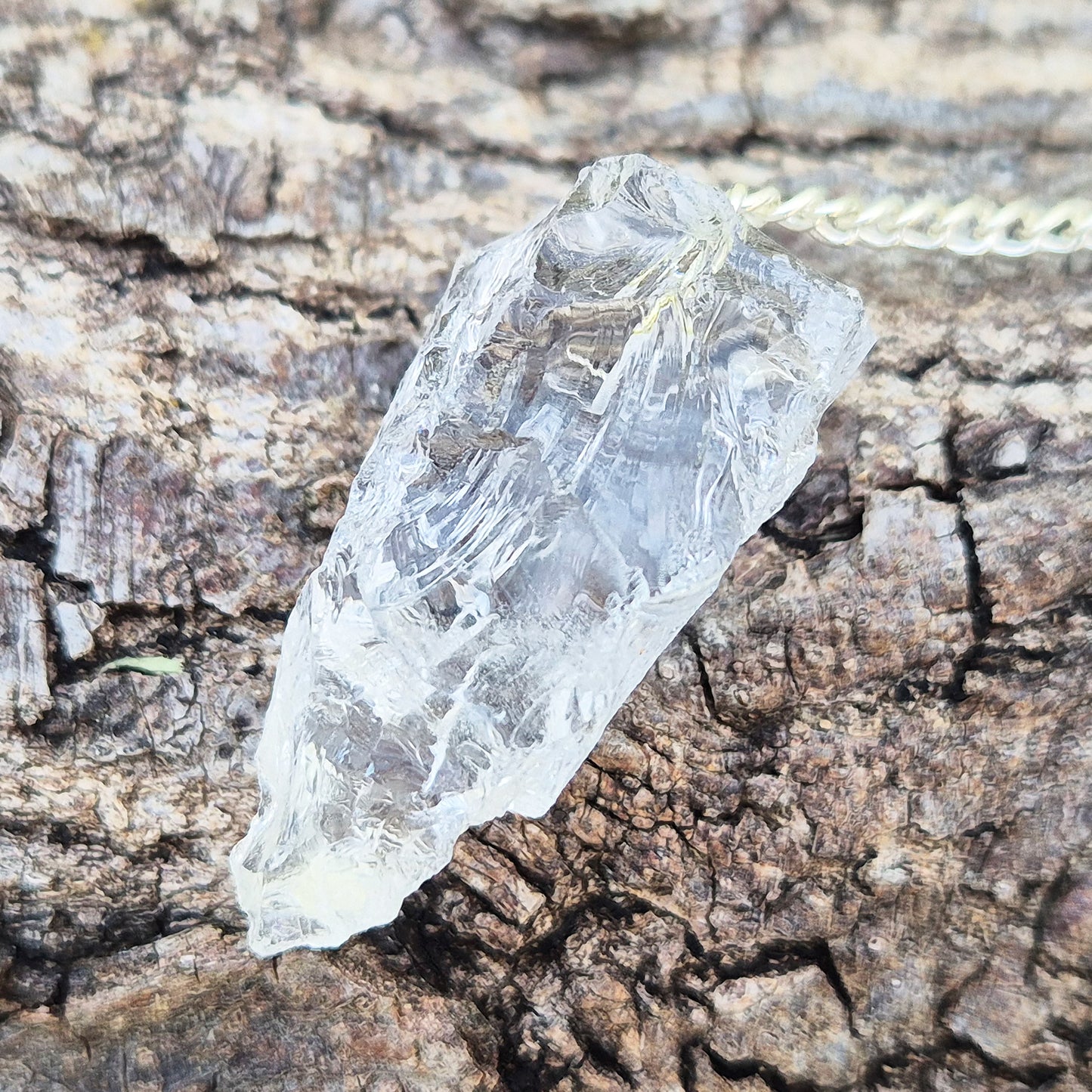 Rock Quartz crystal pendulum for dowsing, energy work, meditation, and connecting with your intuition. A beautiful tool to support focus and awareness.