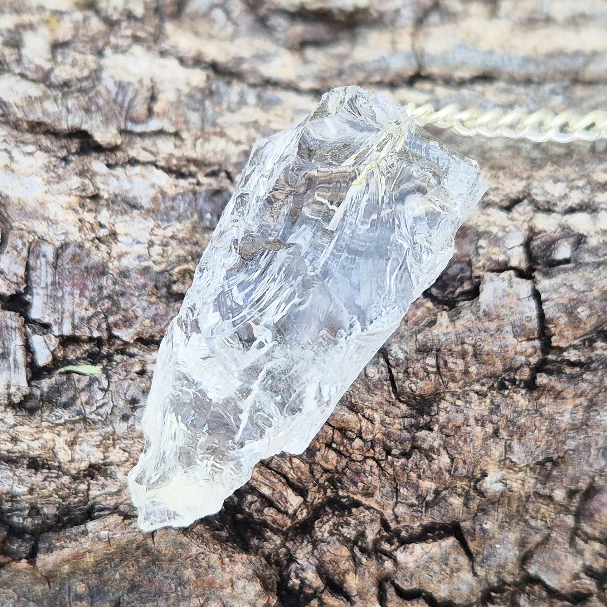 Rock Quartz crystal pendulum for dowsing, energy work, meditation, and connecting with your intuition. A beautiful tool to support focus and awareness.