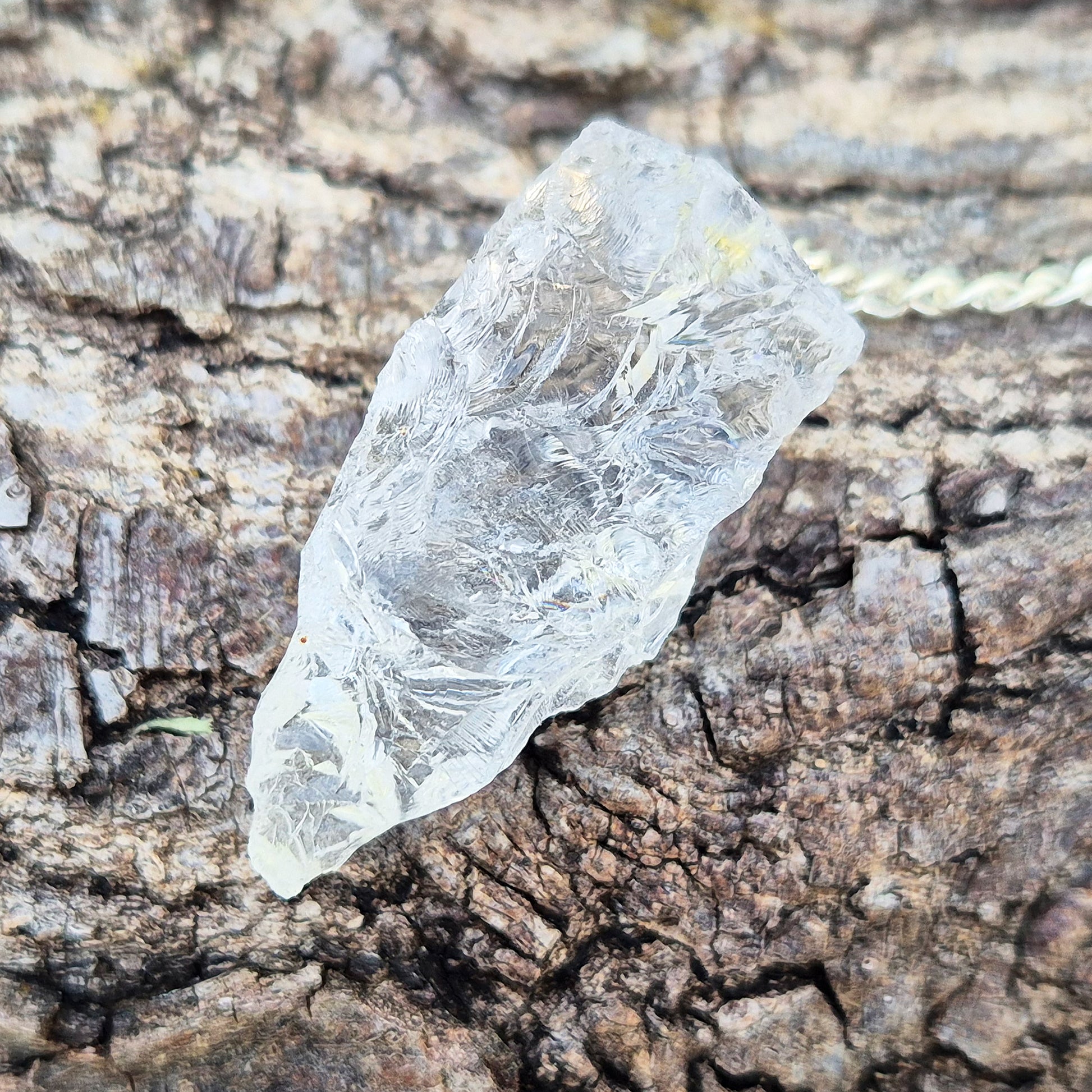 Rock Quartz crystal pendulum for dowsing, energy work, meditation, and connecting with your intuition. A beautiful tool to support focus and awareness.
