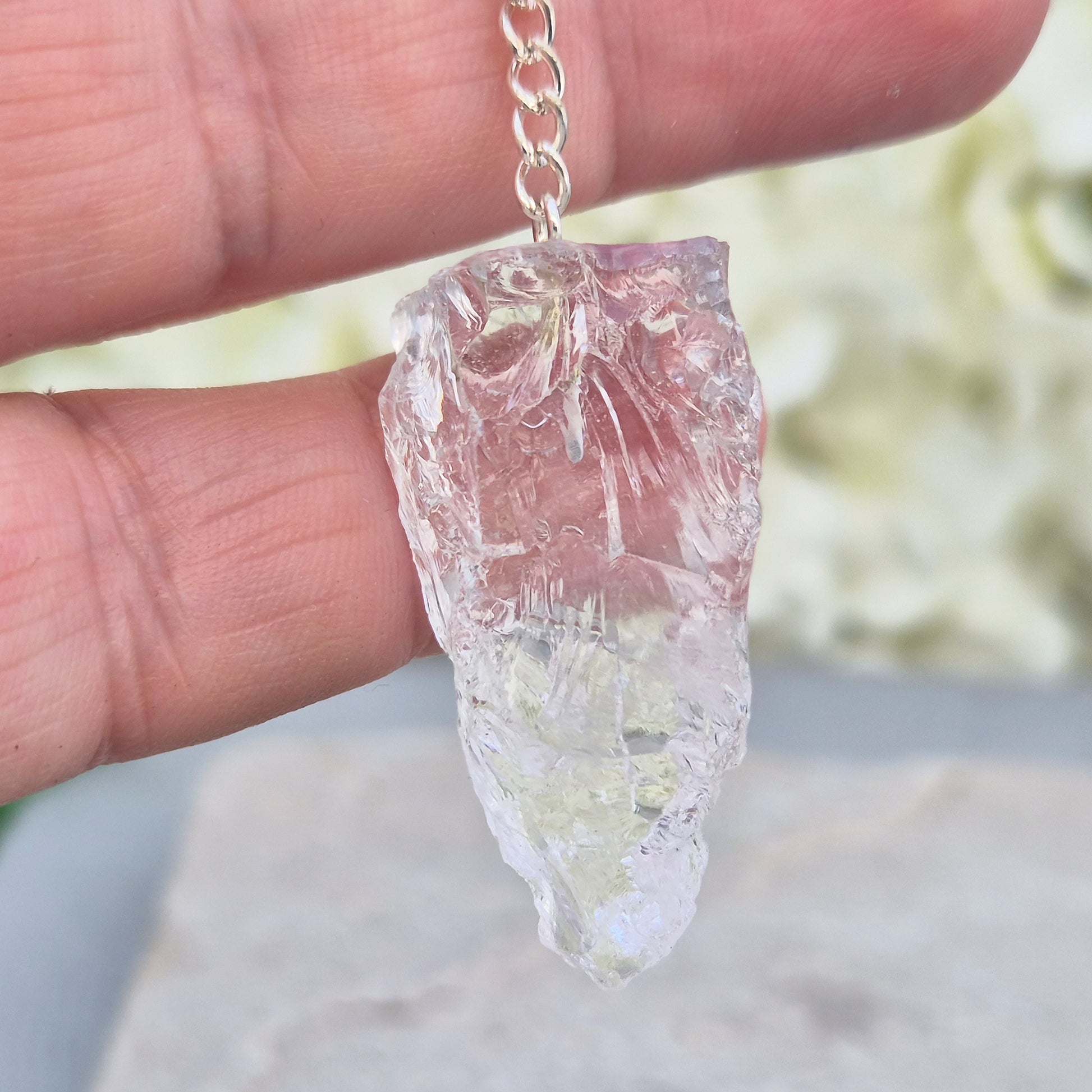 Rock Quartz crystal pendulum for dowsing, energy work, meditation, and connecting with your intuition. A beautiful tool to support focus and awareness.