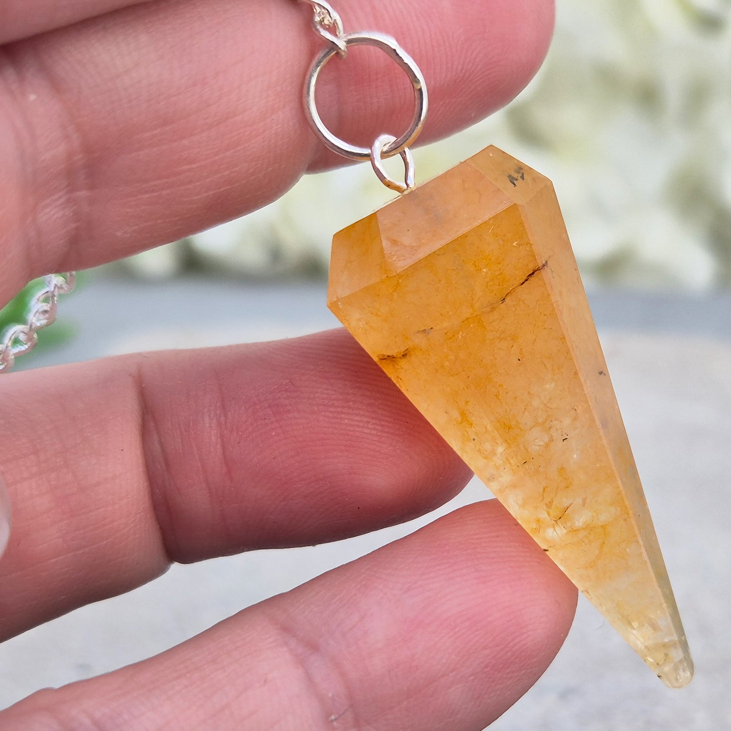 Golden Healer Quartz pendulum for dowsing and energy work. Supports clarity, balance, healing, and connection to higher guidance. 