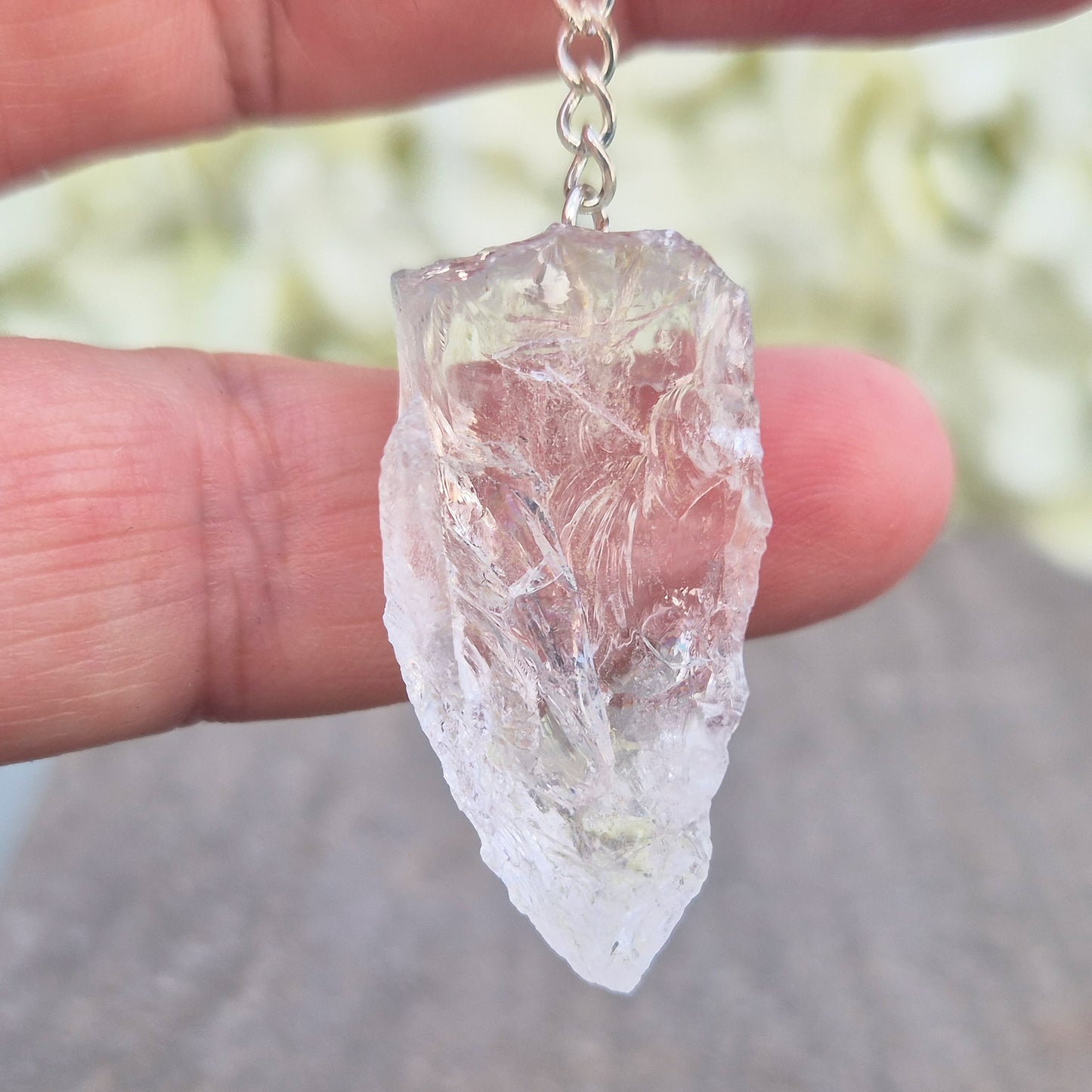Rock Quartz Crystal Pendulum for dowsing and energy work. A versatile tool for guidance, decision-making, and spiritual connection. 