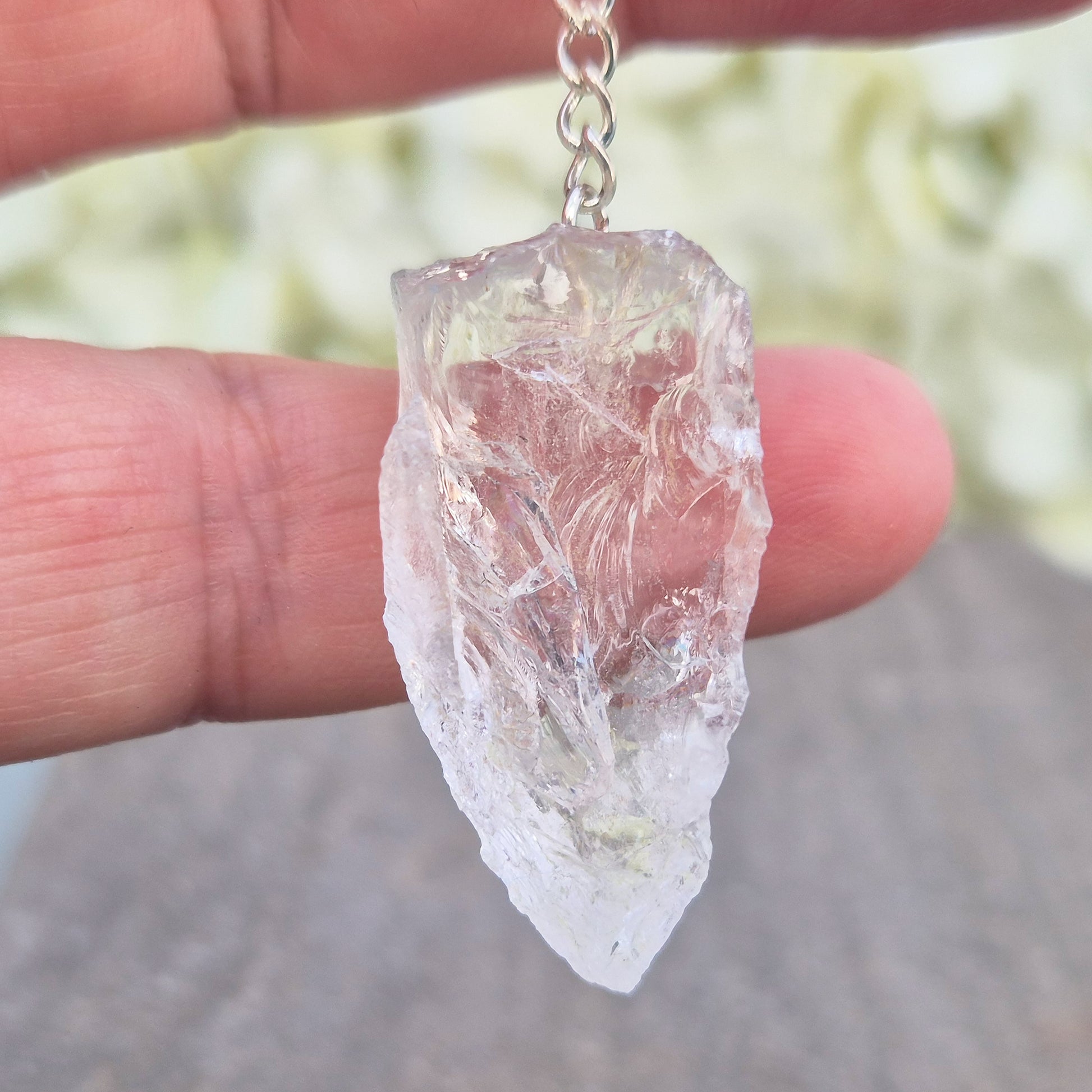 Rock Quartz Crystal Pendulum for dowsing and energy work. A versatile tool for guidance, decision-making, and spiritual connection. 