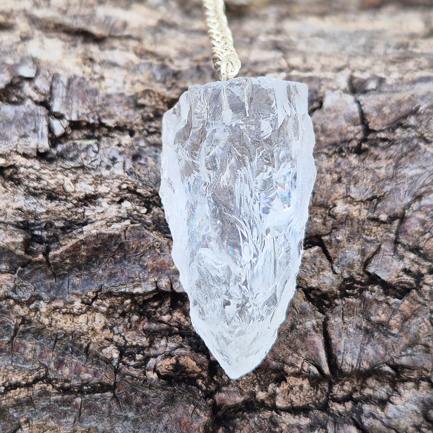 Rock Quartz Crystal Pendulum for dowsing and energy work. A versatile tool for guidance, decision-making, and spiritual connection. 