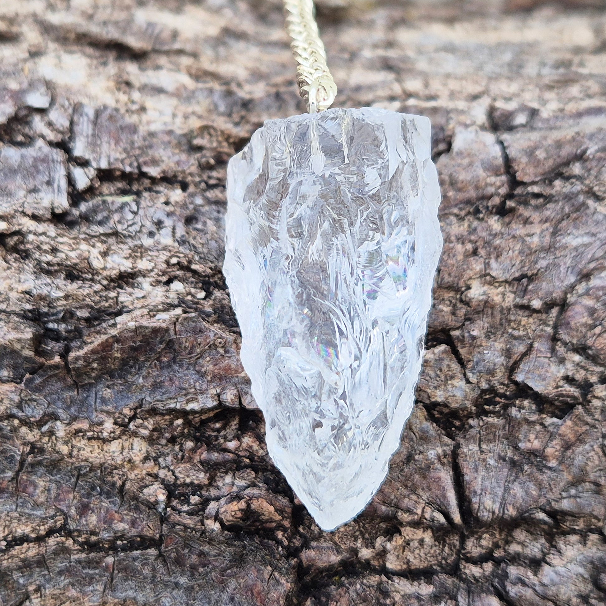 Rock Quartz Crystal Pendulum for dowsing and energy work. A versatile tool for guidance, decision-making, and spiritual connection. 