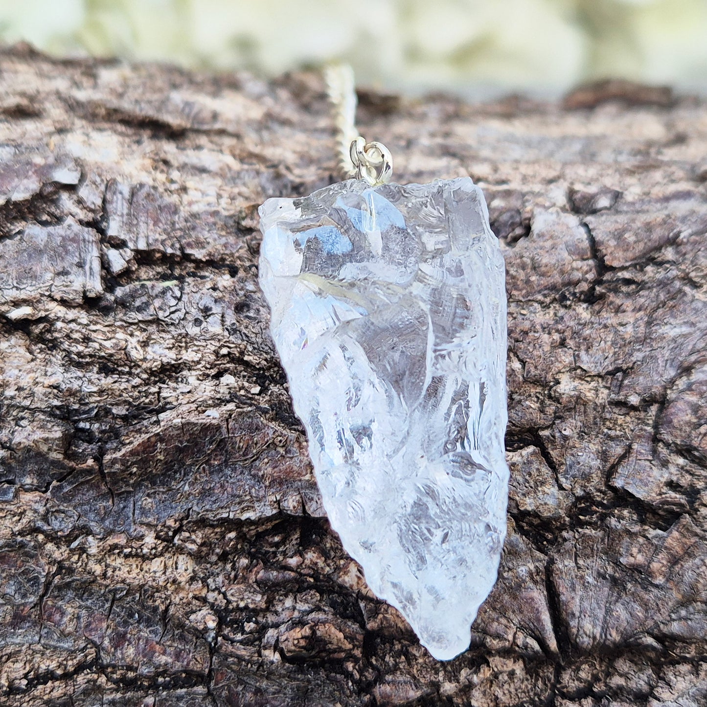 Rock Quartz Crystal Pendulum for dowsing and energy work. A versatile tool for guidance, decision-making, and spiritual connection. 