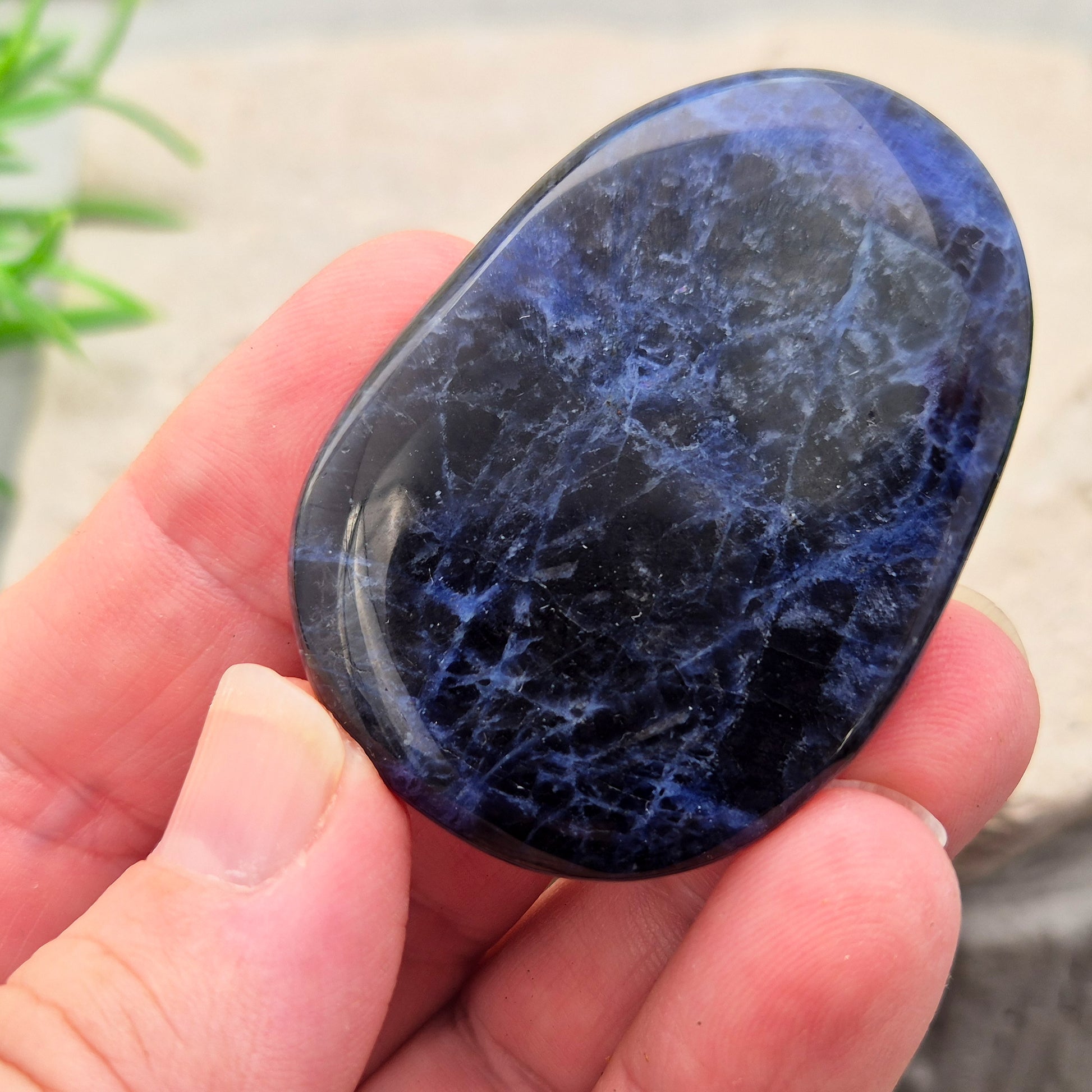 Beautiful A-grade Sodalite palm stone from Namibia. Supports clear thinking, confidence in communication, and emotional calm. Carry with you.