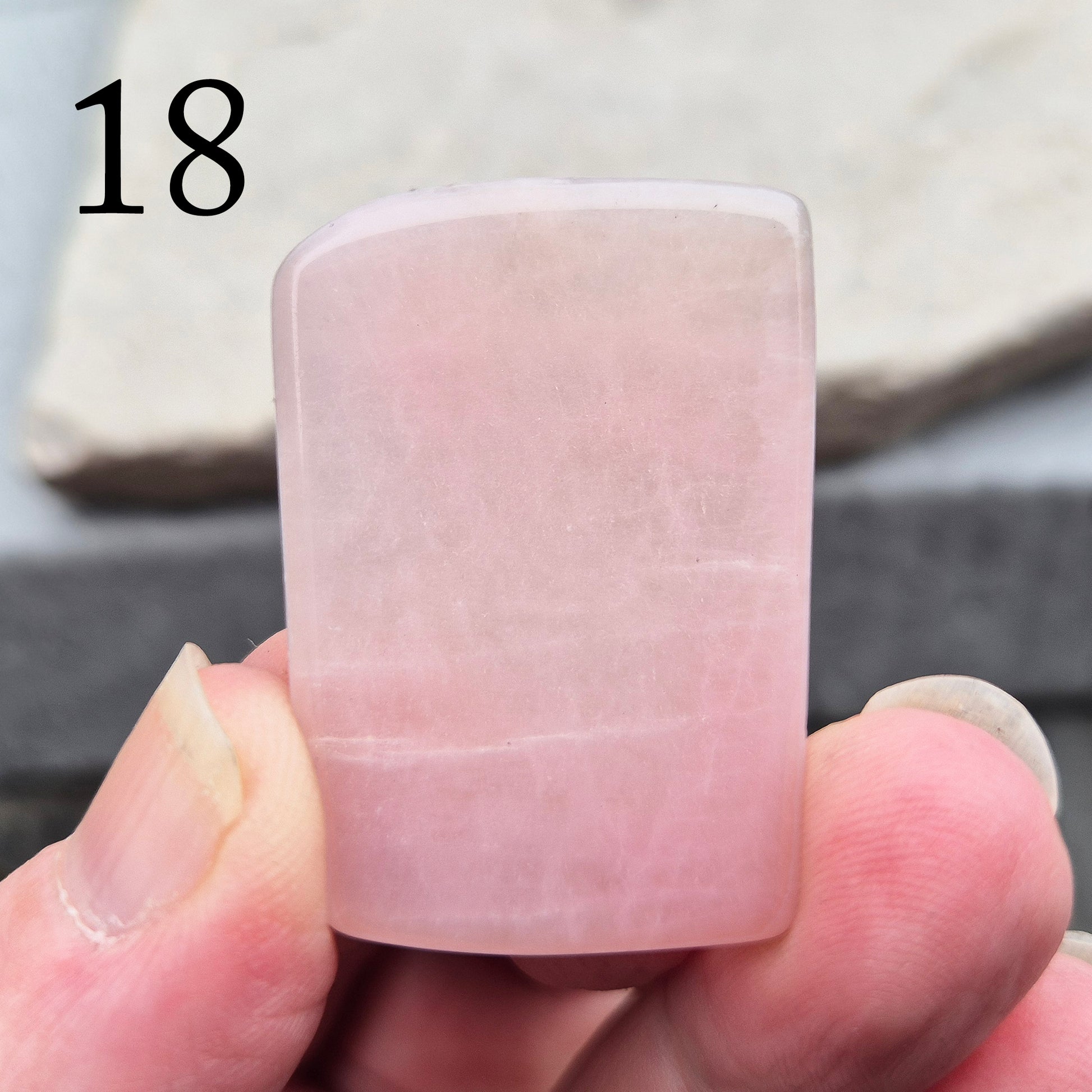 This Pink Petalite polished slice shows soft, pale pink tones. Cut into a flat slice, these pieces are ideal for jewellery making, crystal grids, or carrying in a pocket or bag.