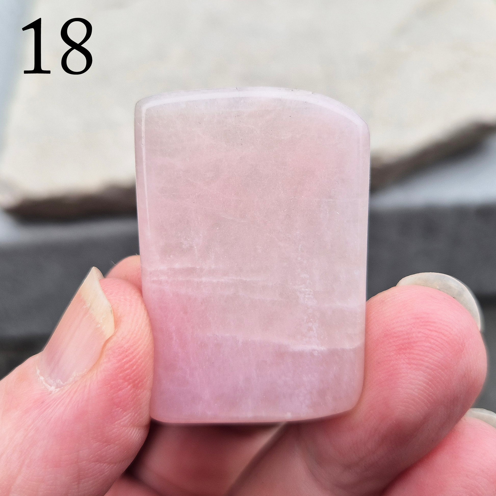This Pink Petalite polished slice shows soft, pale pink tones. Cut into a flat slice, these pieces are ideal for jewellery making, crystal grids, or carrying in a pocket or bag.