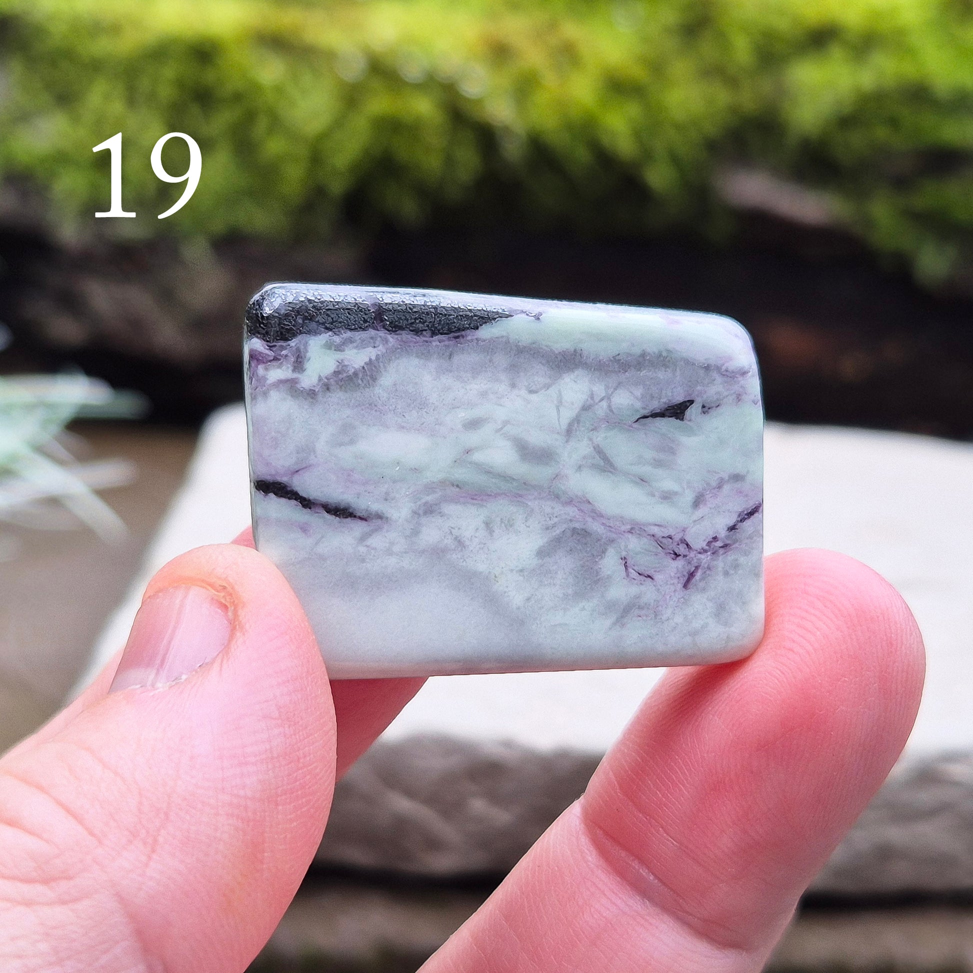 This polished Kammererite crystal slice comes from Turkey and reveals rich violet-purple tones, often accented with natural green inclusions of Chromite, Chlorite, or Serpentine. Sometimes referred to as Purple Seraphinite, these flat slices are smooth, lightweight, and easy to hold or carry in a pocket.