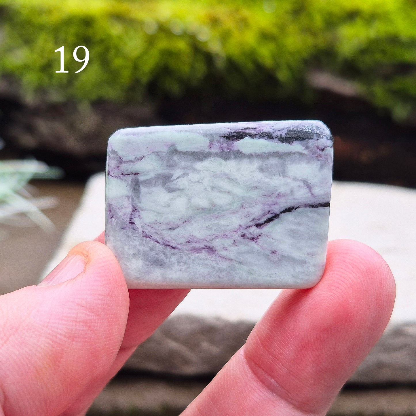 This polished Kammererite crystal slice comes from Turkey and reveals rich violet-purple tones, often accented with natural green inclusions of Chromite, Chlorite, or Serpentine. Sometimes referred to as Purple Seraphinite, these flat slices are smooth, lightweight, and easy to hold or carry in a pocket.