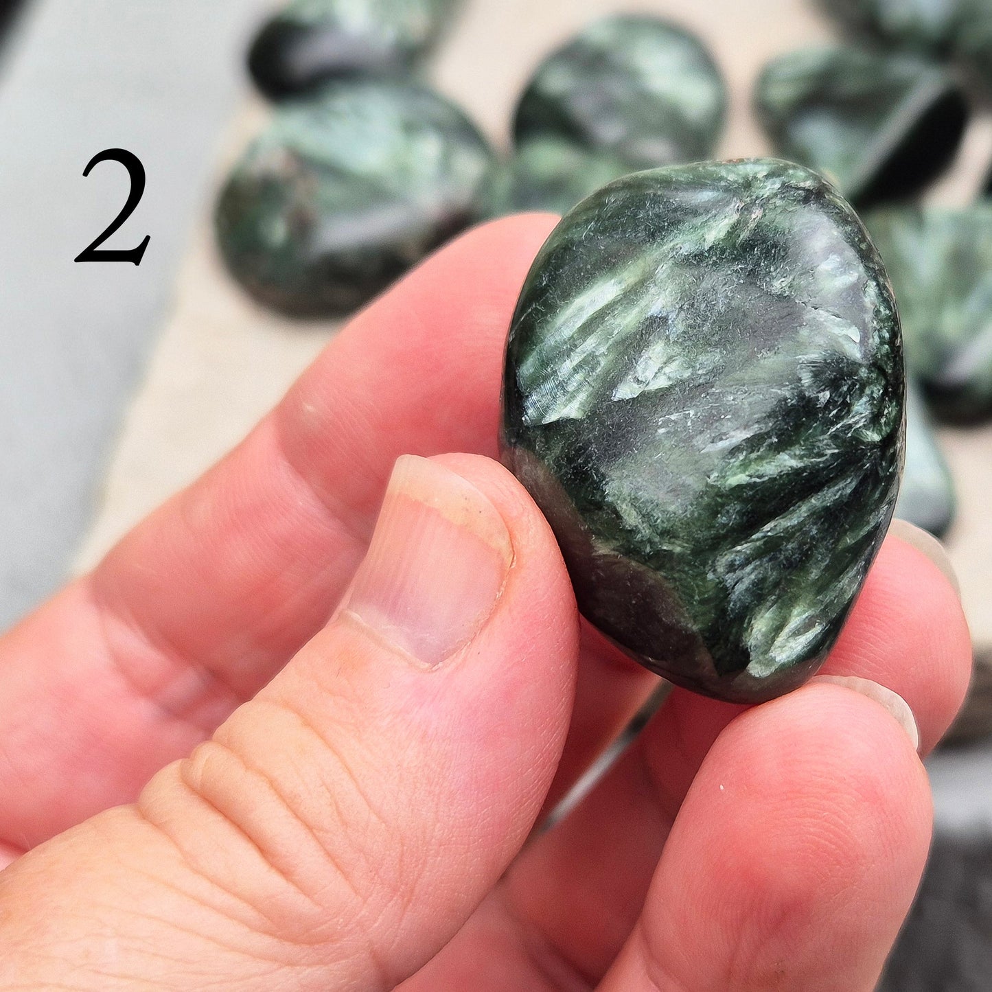 Seraphinite crystal for grounding, heart healing, and gentle spiritual growth. Handpicked pieces with rich green coloring for everyday energy work.