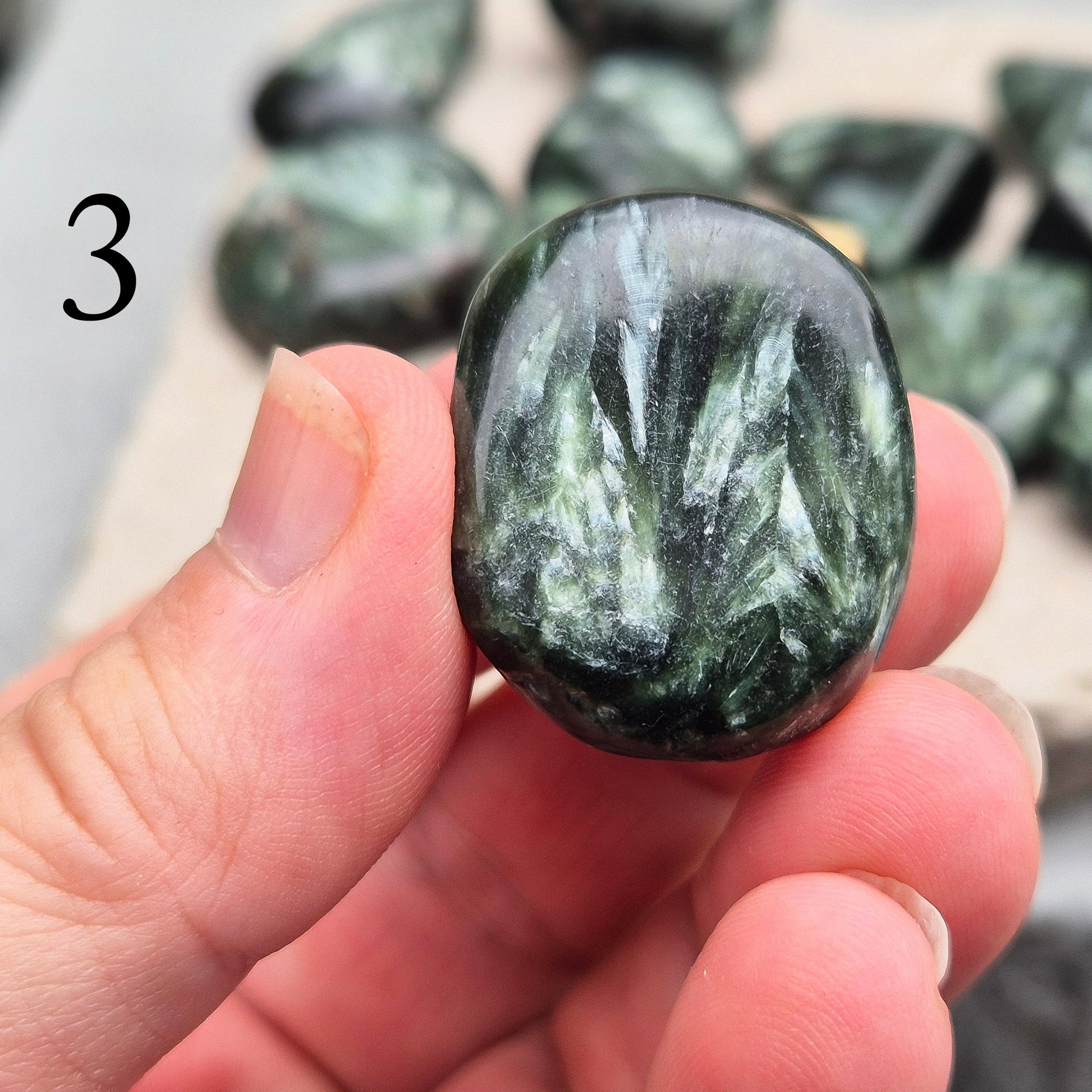 Seraphinite crystal for grounding, heart healing, and gentle spiritual growth. Handpicked pieces with rich green coloring for everyday energy work.