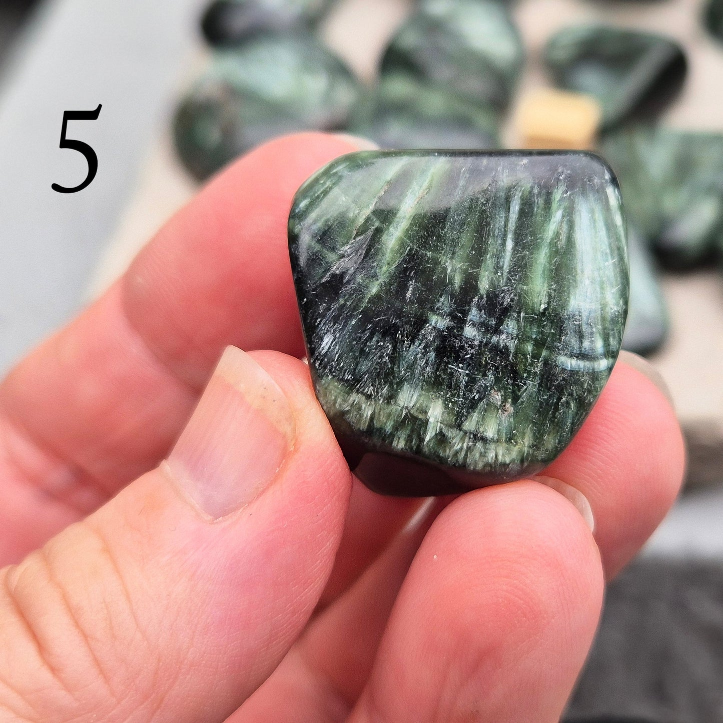 Seraphinite crystal for grounding, heart healing, and gentle spiritual growth. Handpicked pieces with rich green coloring for everyday energy work.