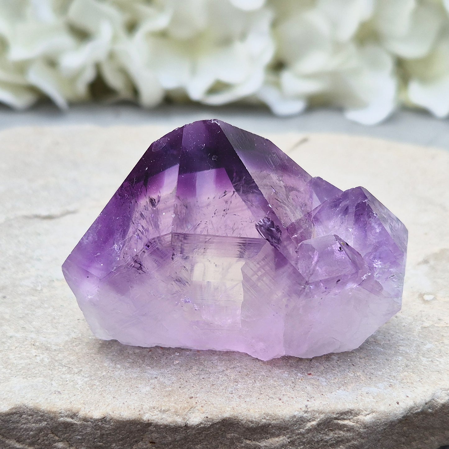 Amethyst standing point with rich purple tones, ideal for creating a calm, grounded space. A striking piece for display, meditation, or everyday energy support.
