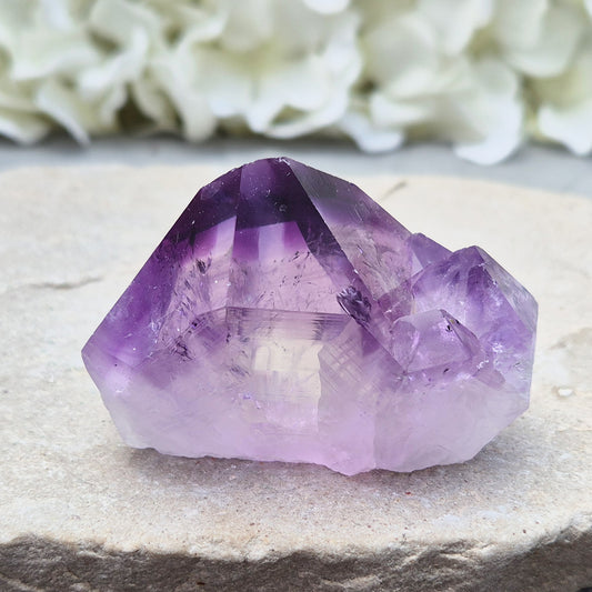 Amethyst standing point with rich purple tones, ideal for creating a calm, grounded space. A striking piece for display, meditation, or everyday energy support.