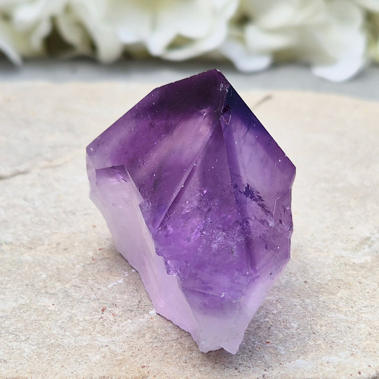 Amethyst standing point with rich purple tones, ideal for creating a calm, grounded space. A striking piece for display, meditation, or everyday energy support.
