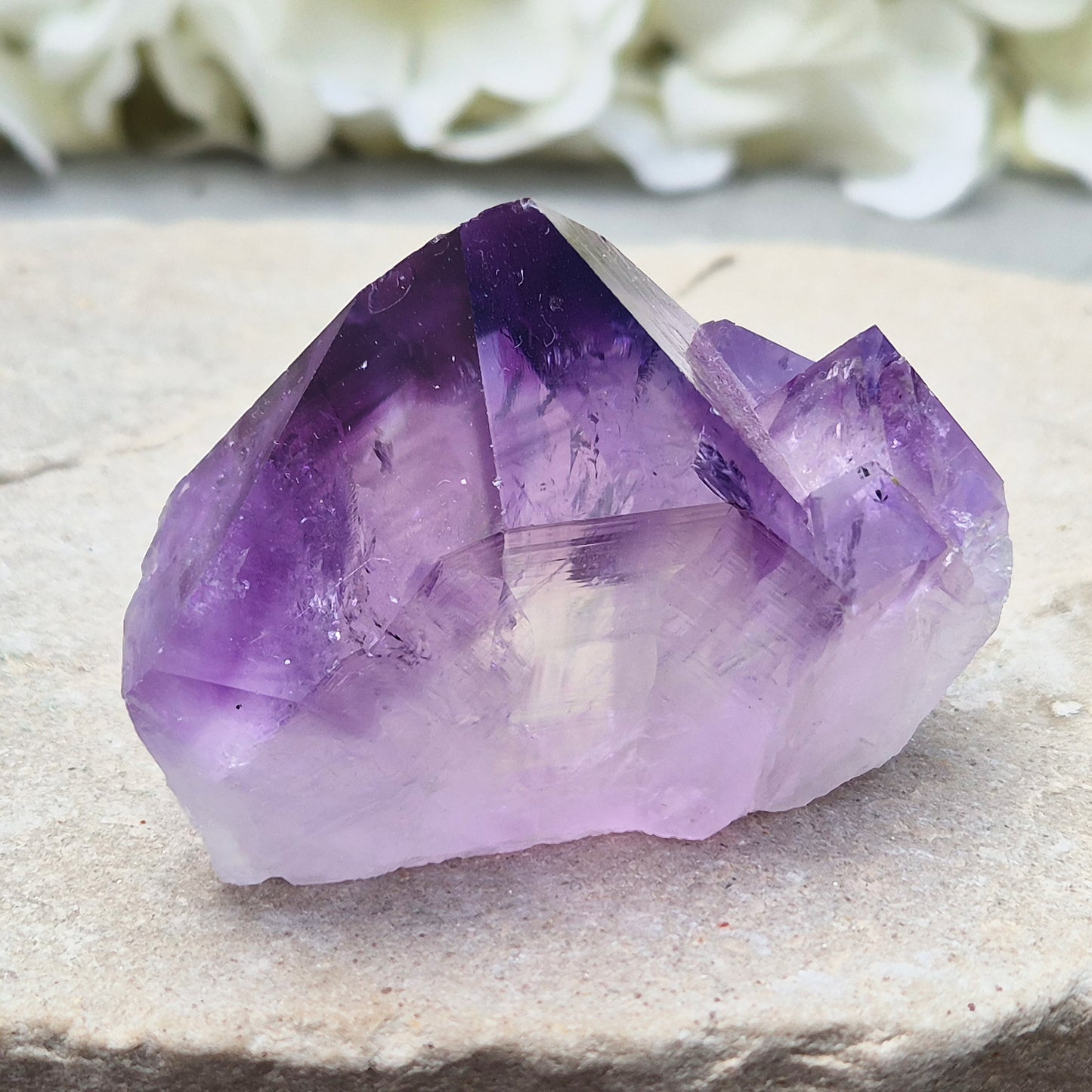 Amethyst standing point with rich purple tones, ideal for creating a calm, grounded space. A striking piece for display, meditation, or everyday energy support.