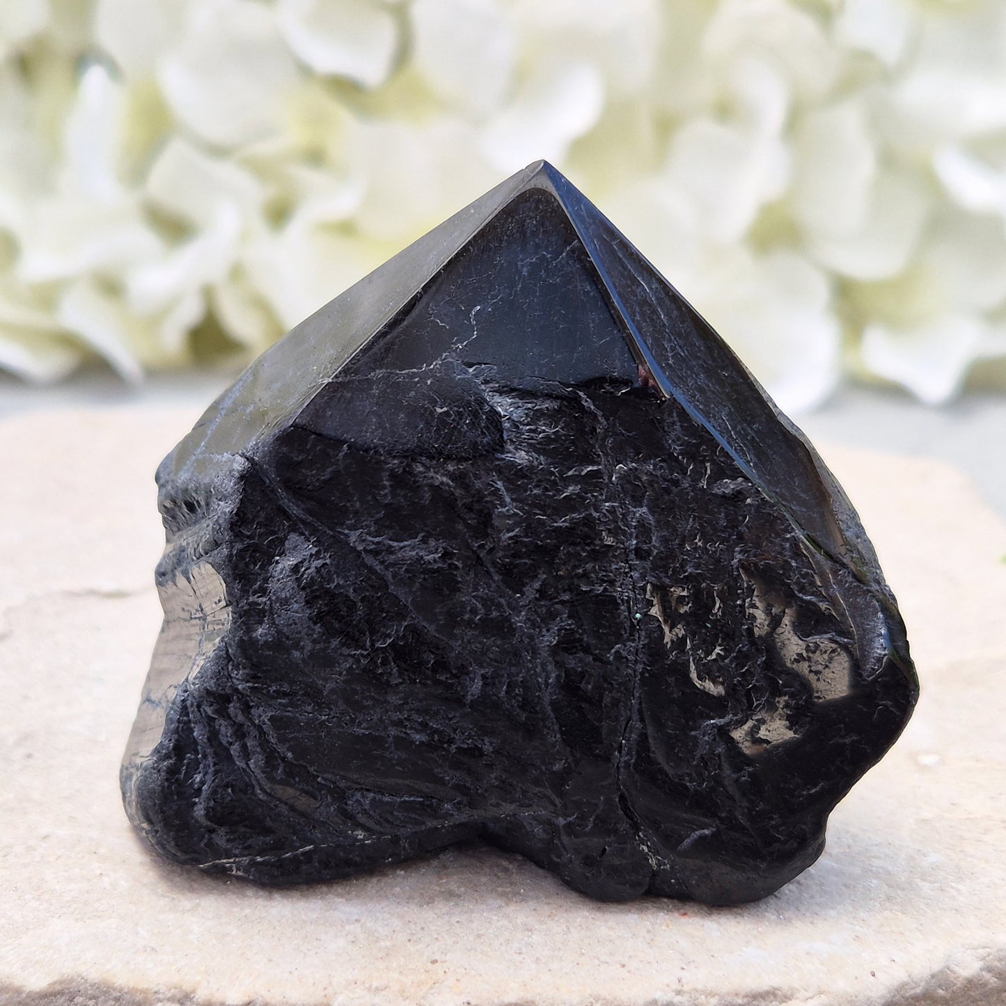 Hand-picked A grade Black Tourmaline standing point from a UK independent shop. Known for grounding energy — a striking, one-of-a-kind piece.